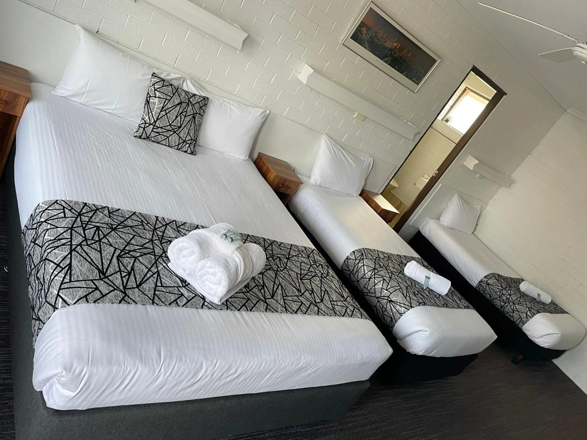 Bed in Coastal Bay Motel