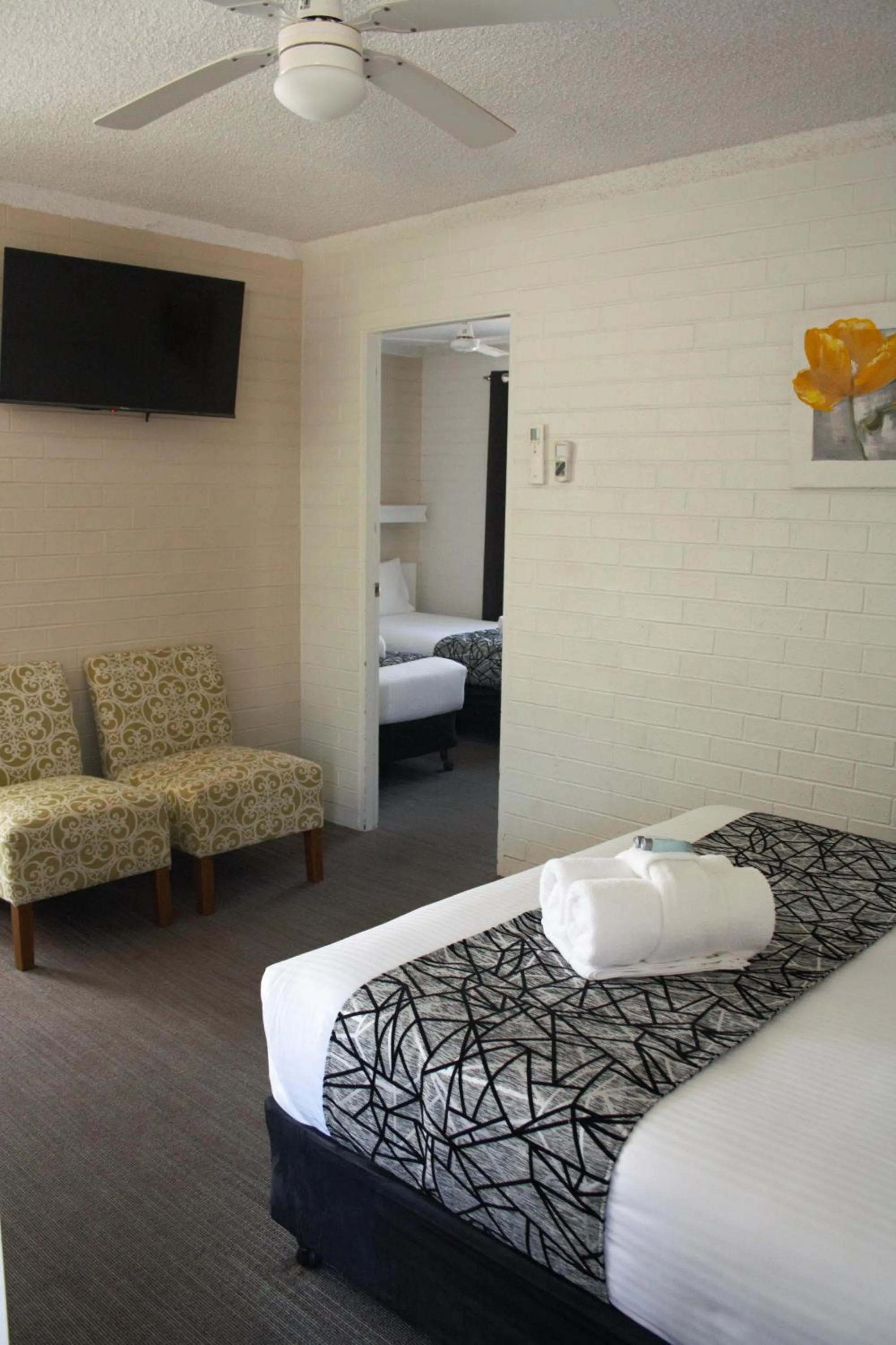 Bed in Coastal Bay Motel