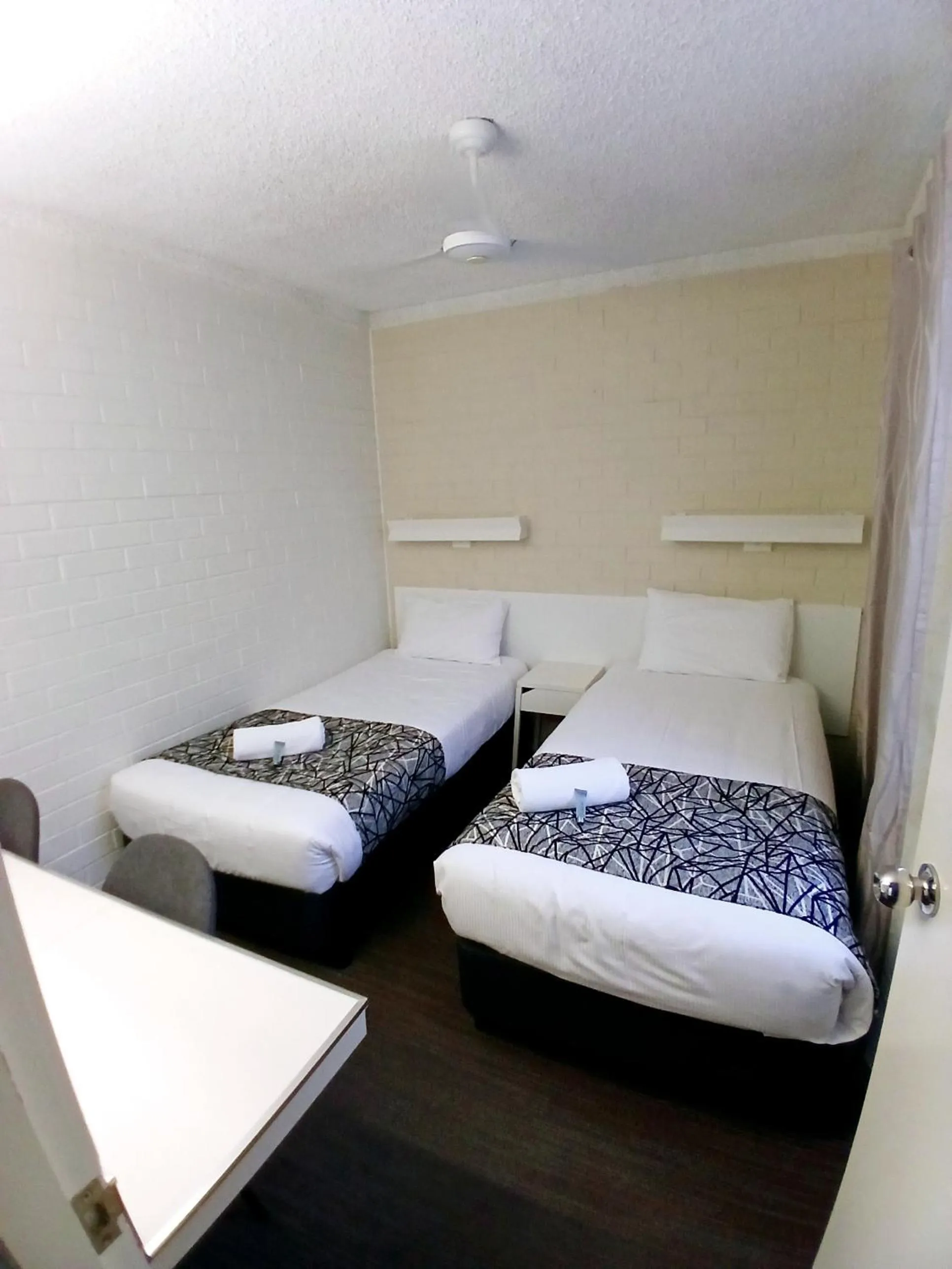 Bed in Coastal Bay Motel