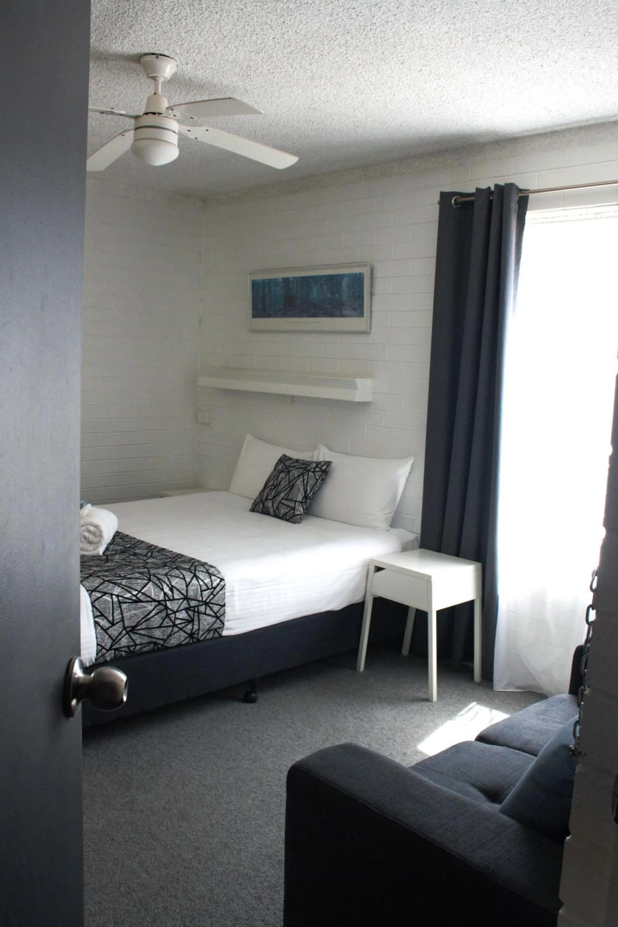 Bed in Coastal Bay Motel