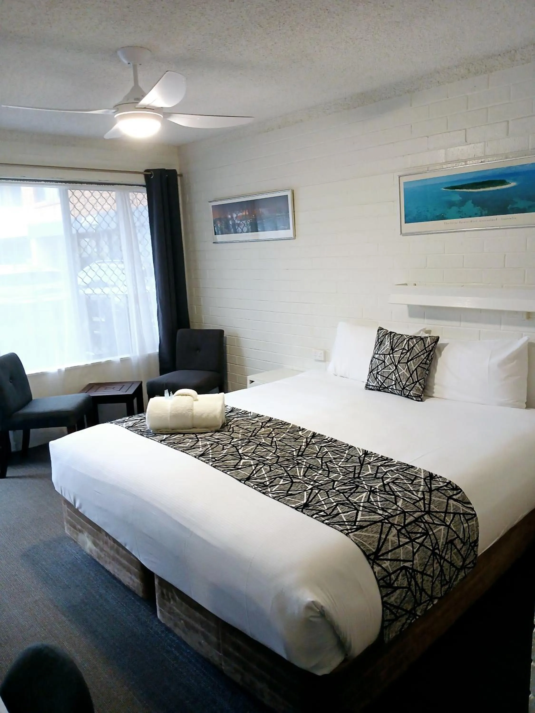 Bed in Coastal Bay Motel