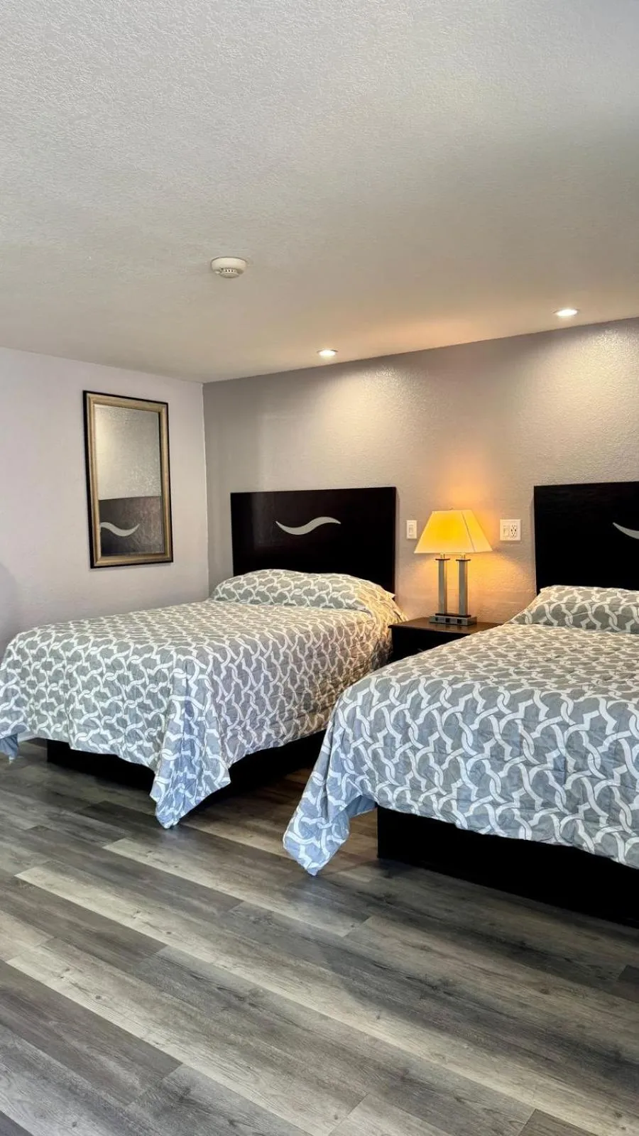 Bed in Chisholm's Motor Inn