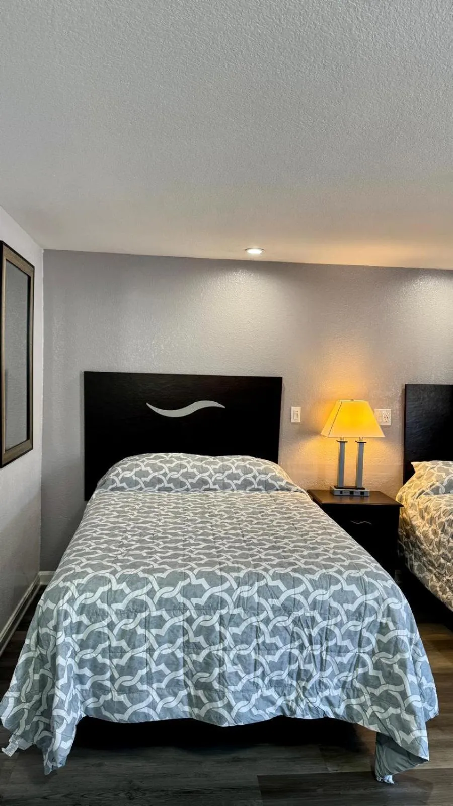 Bed in Chisholm's Motor Inn