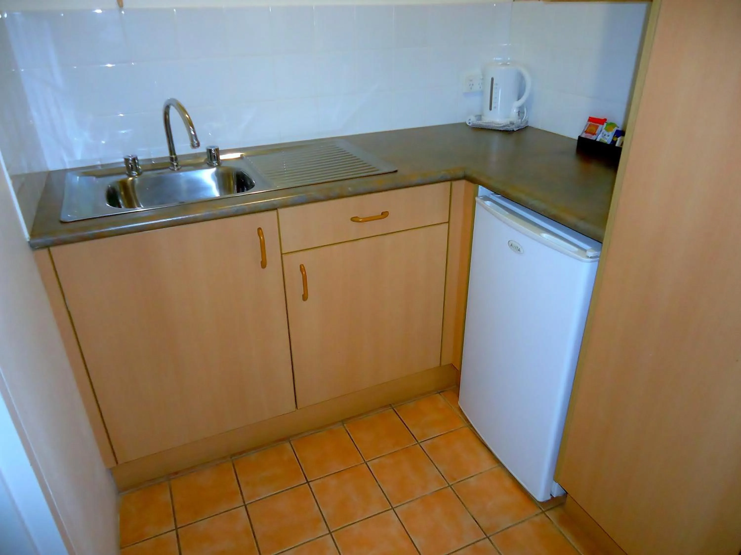 Kitchen or kitchenette in Aston Hill Motor Lodge