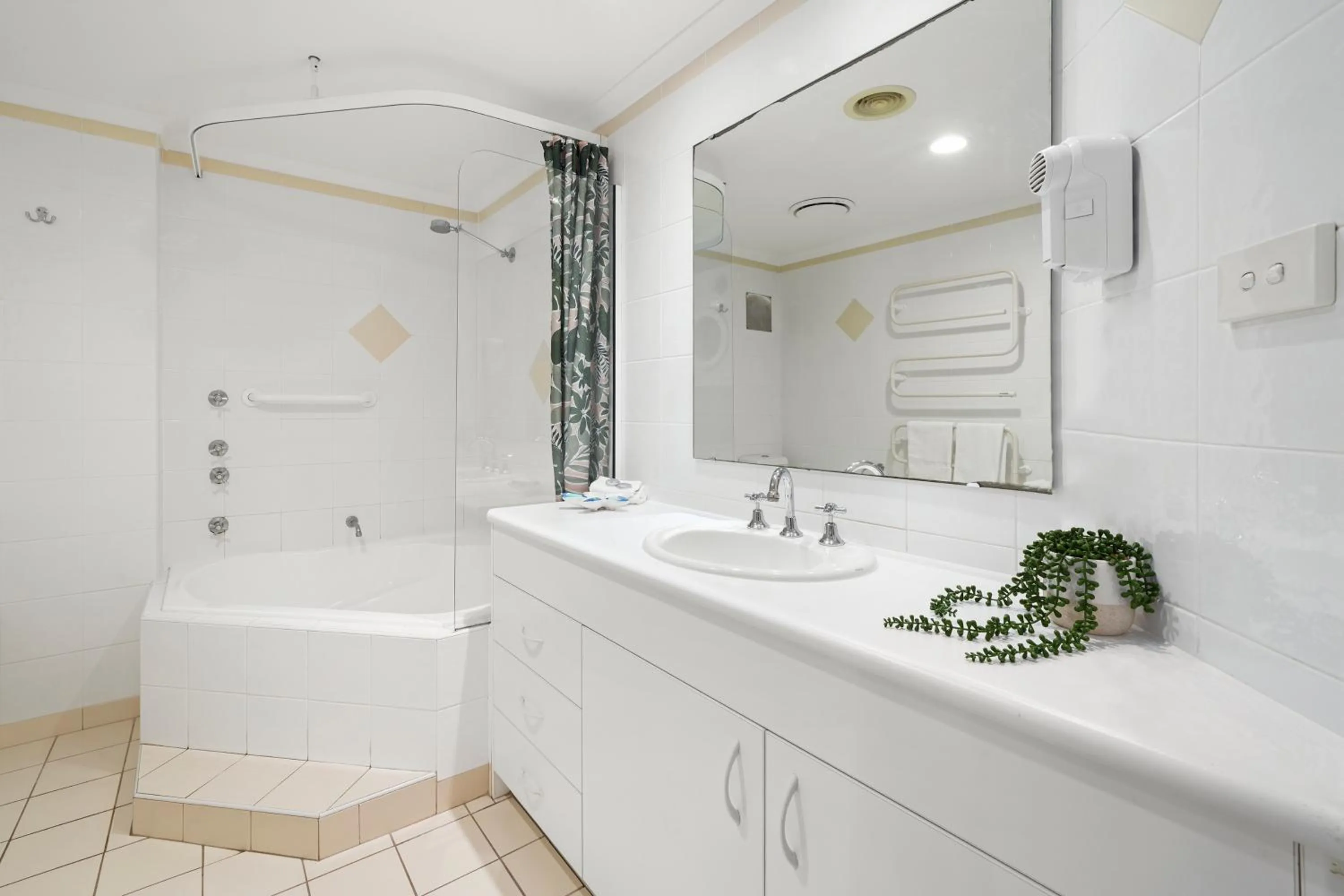 Bathroom in Town Beach Beachcomber Resort