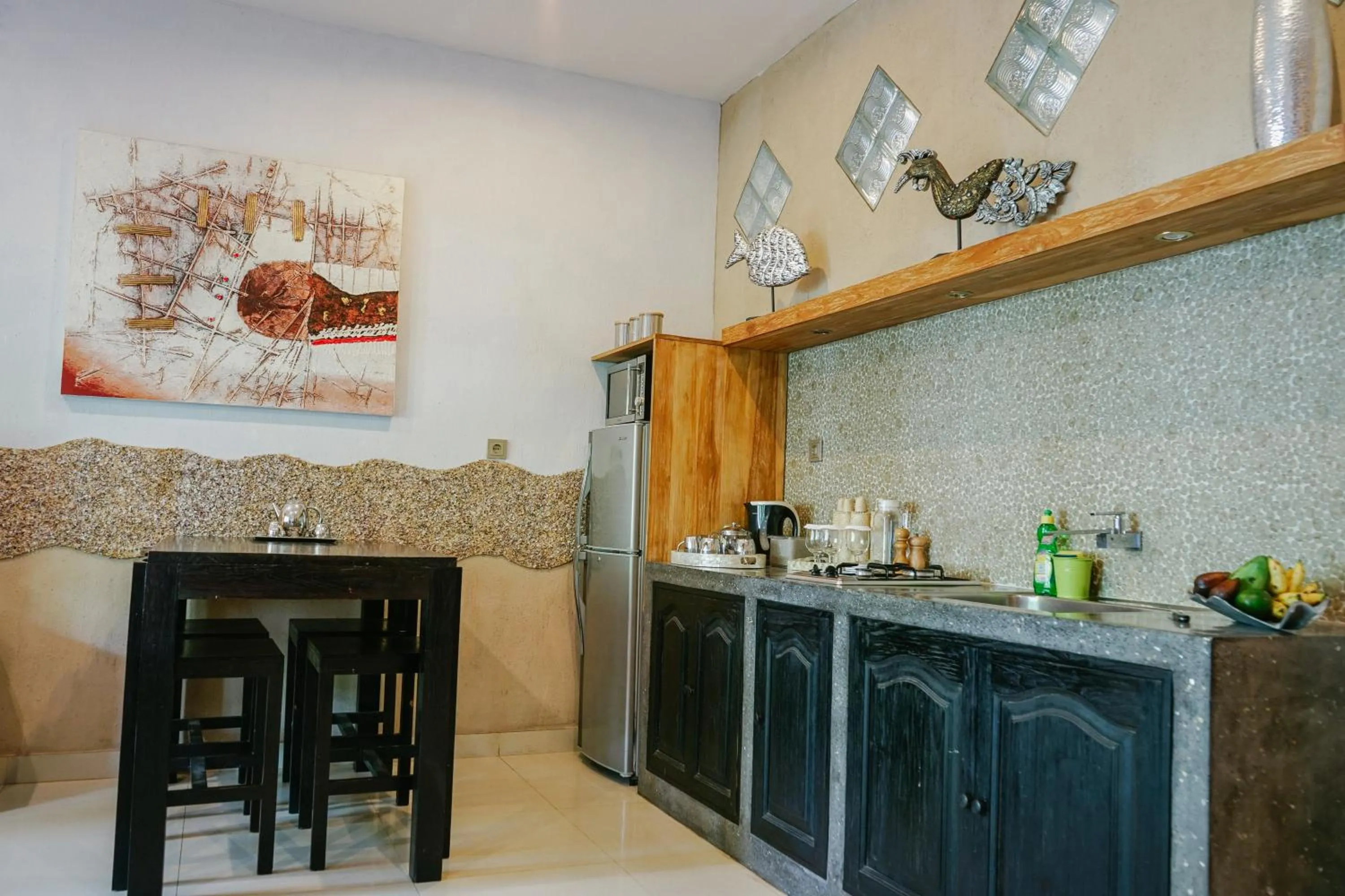 Kitchen or kitchenette in Puri Dajuma Beach Eco-Resort & Spa