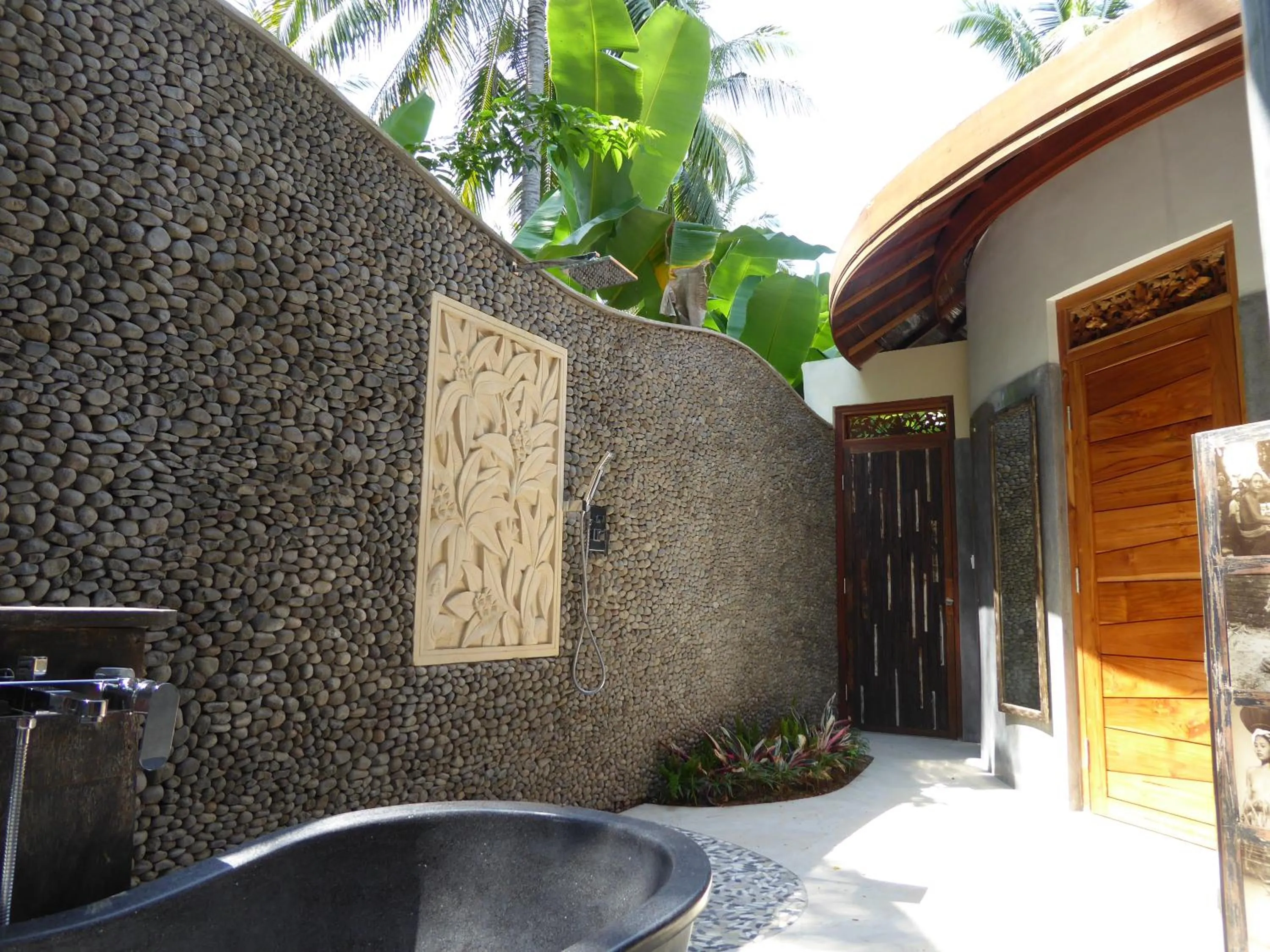 Bathroom in Puri Dajuma Beach Eco-Resort & Spa