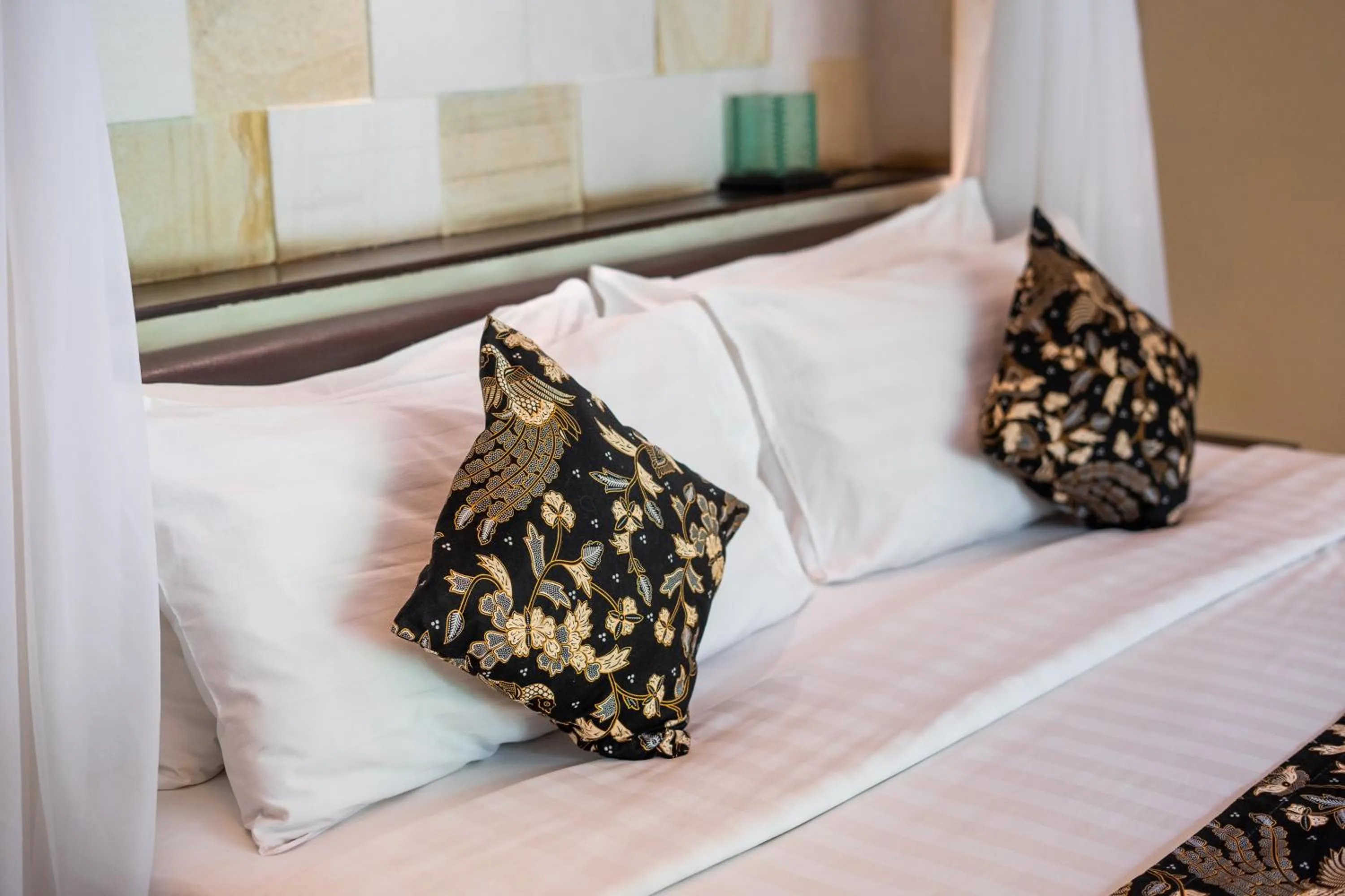 Bed in The Maya Seminyak Villas