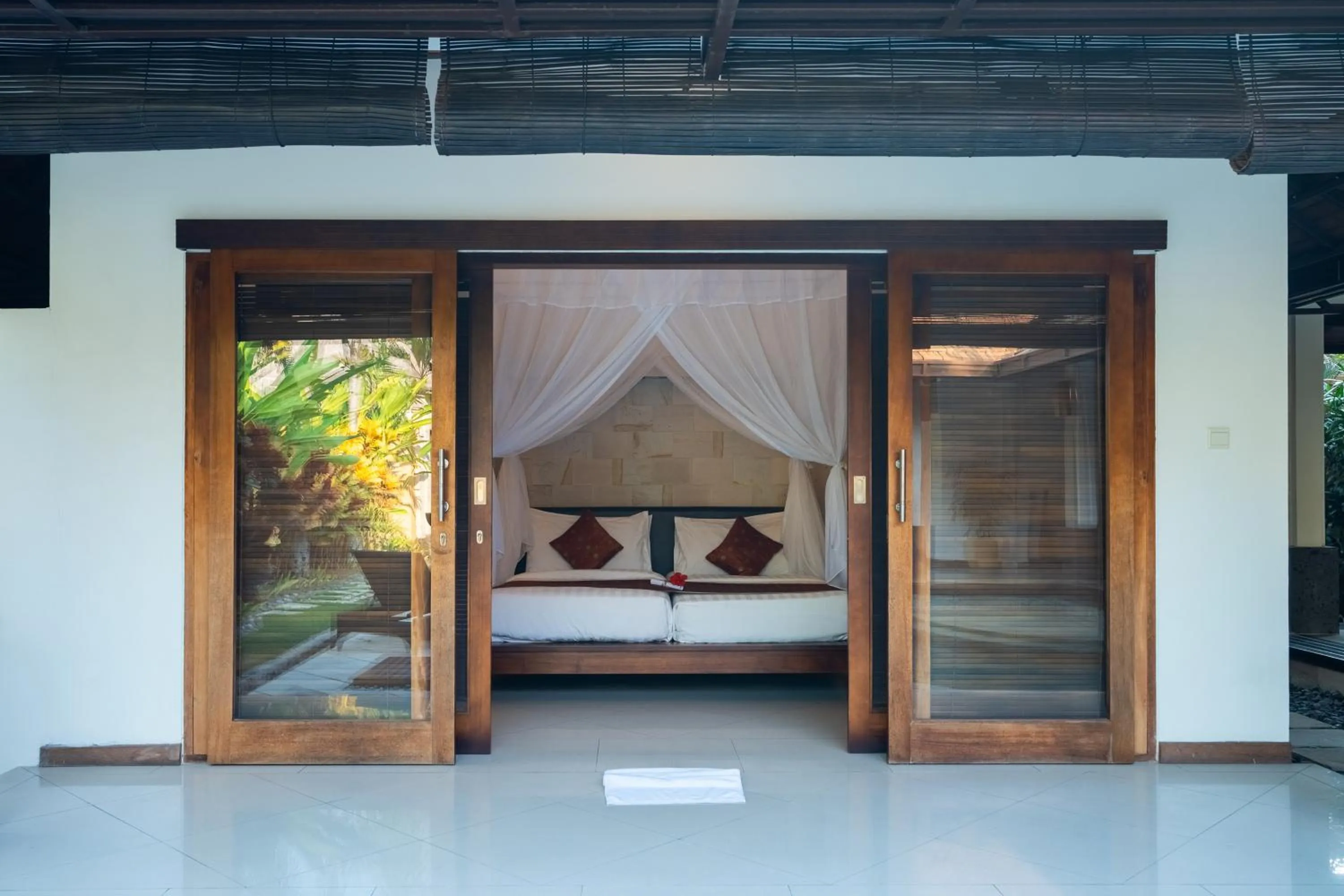 Bed in The Maya Seminyak Villas