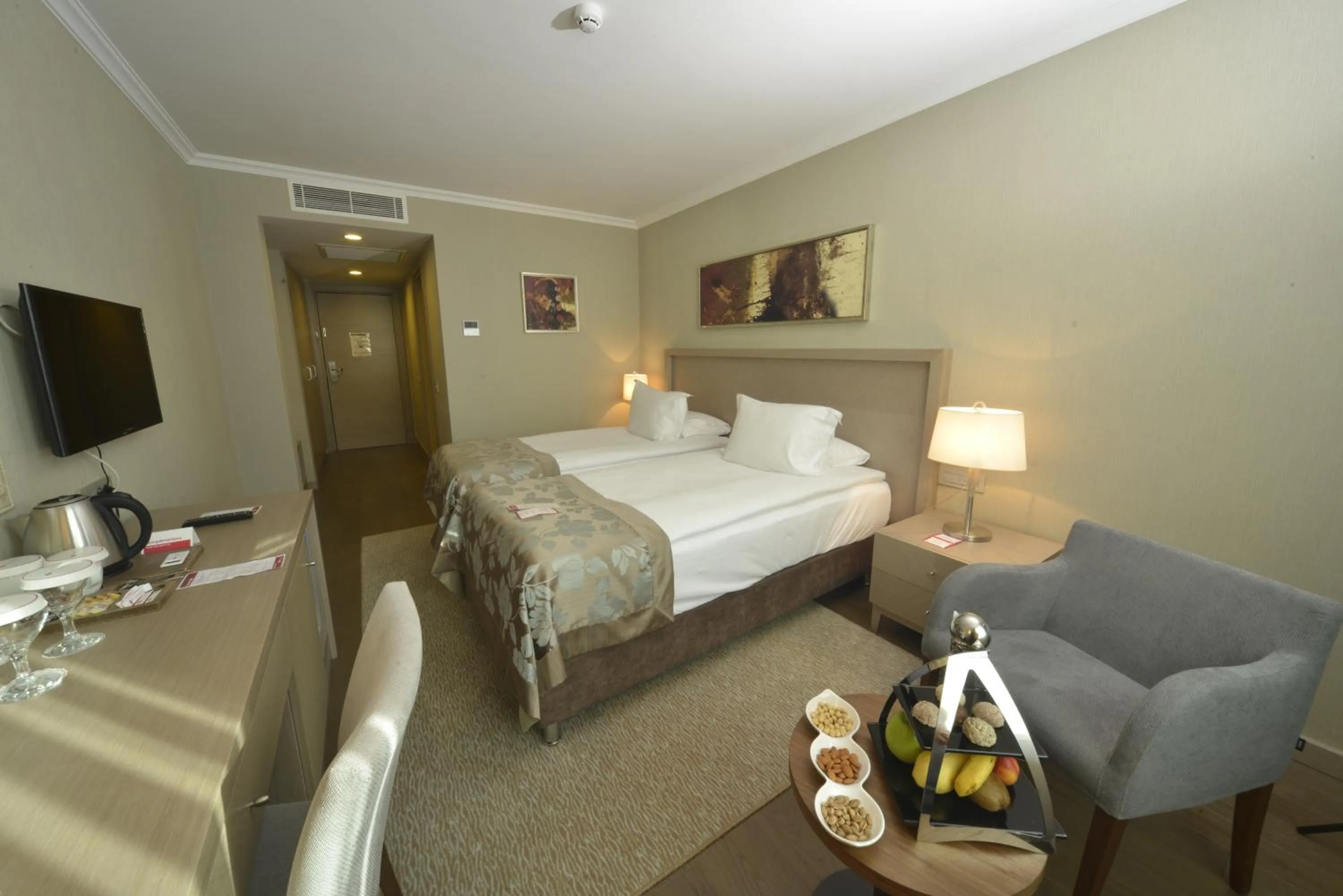 Communal lounge/ TV room in Ramada Plaza By Wyndham Kahramanmaras