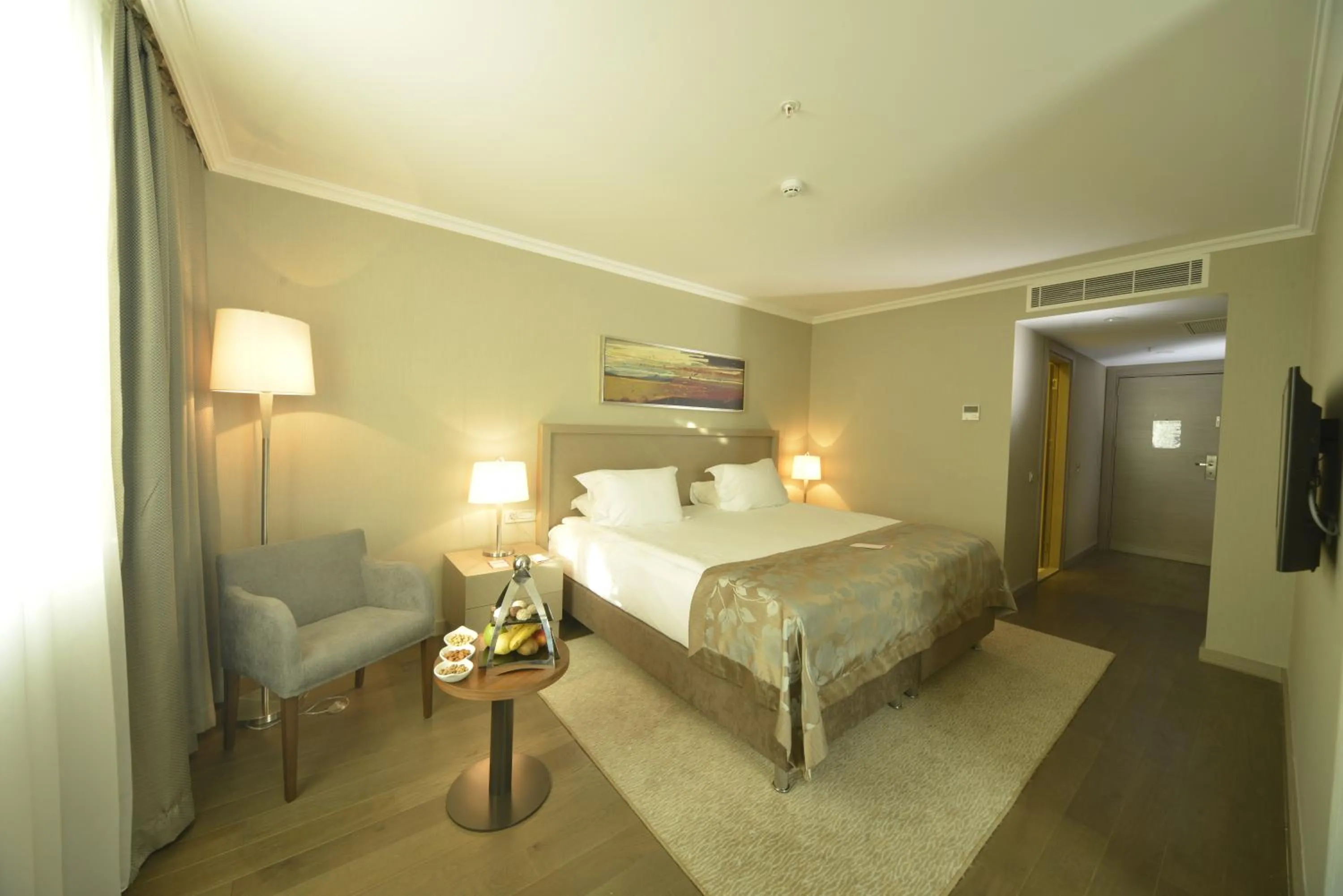 Communal lounge/ TV room in Ramada Plaza By Wyndham Kahramanmaras