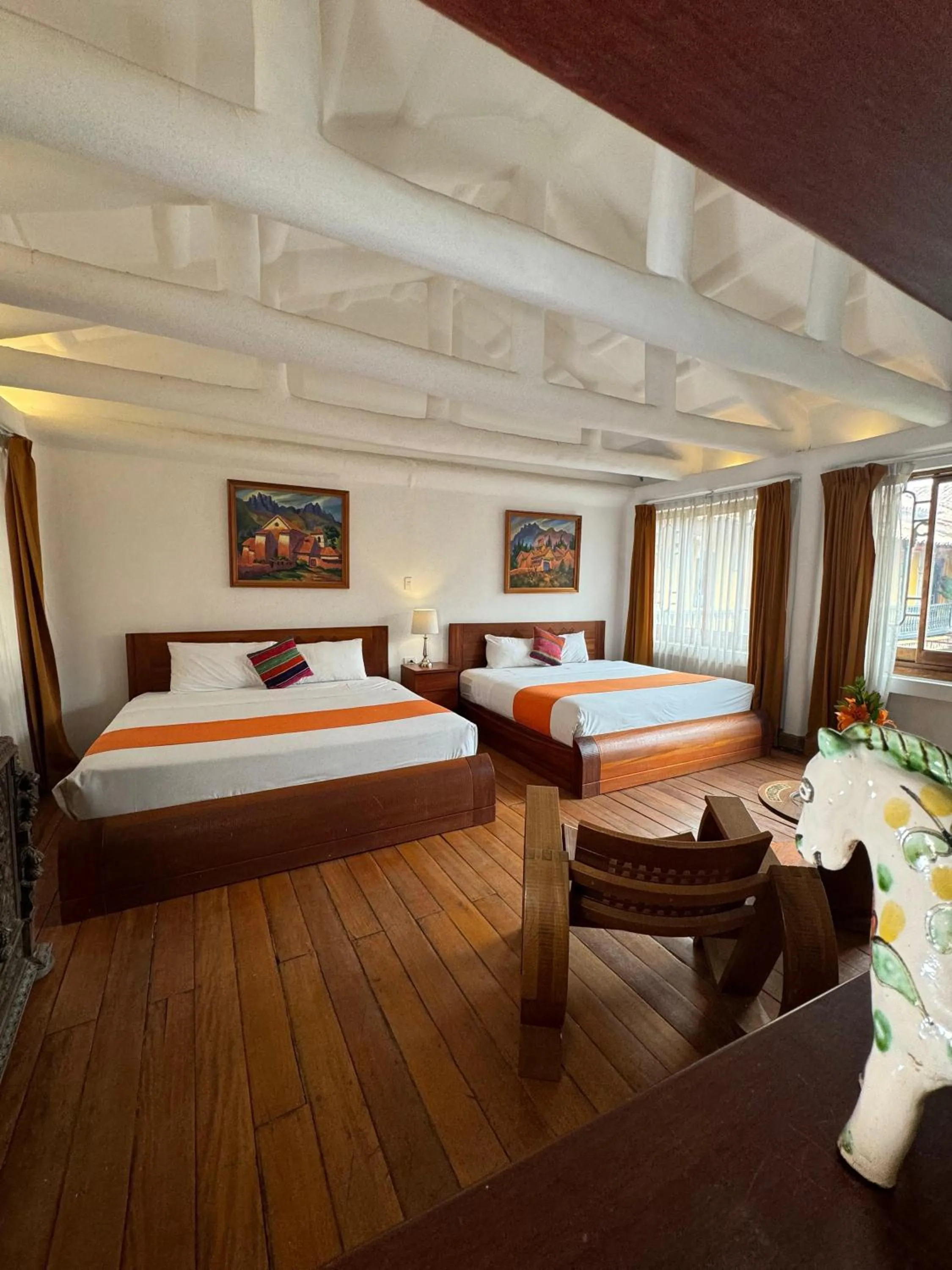 Photo of the whole room, Bed in Waman Qorikancha