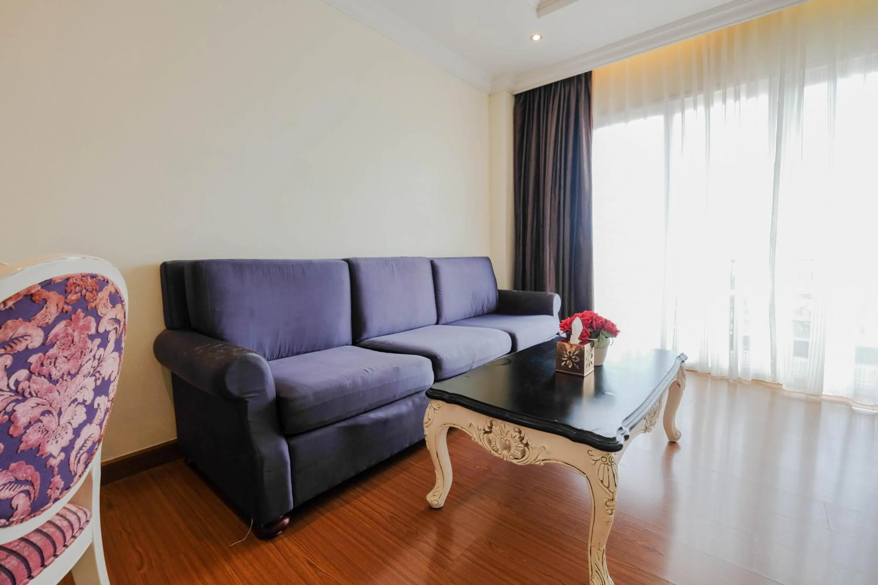 Seating area in LK Miracle Suite - SHA Extra Plus