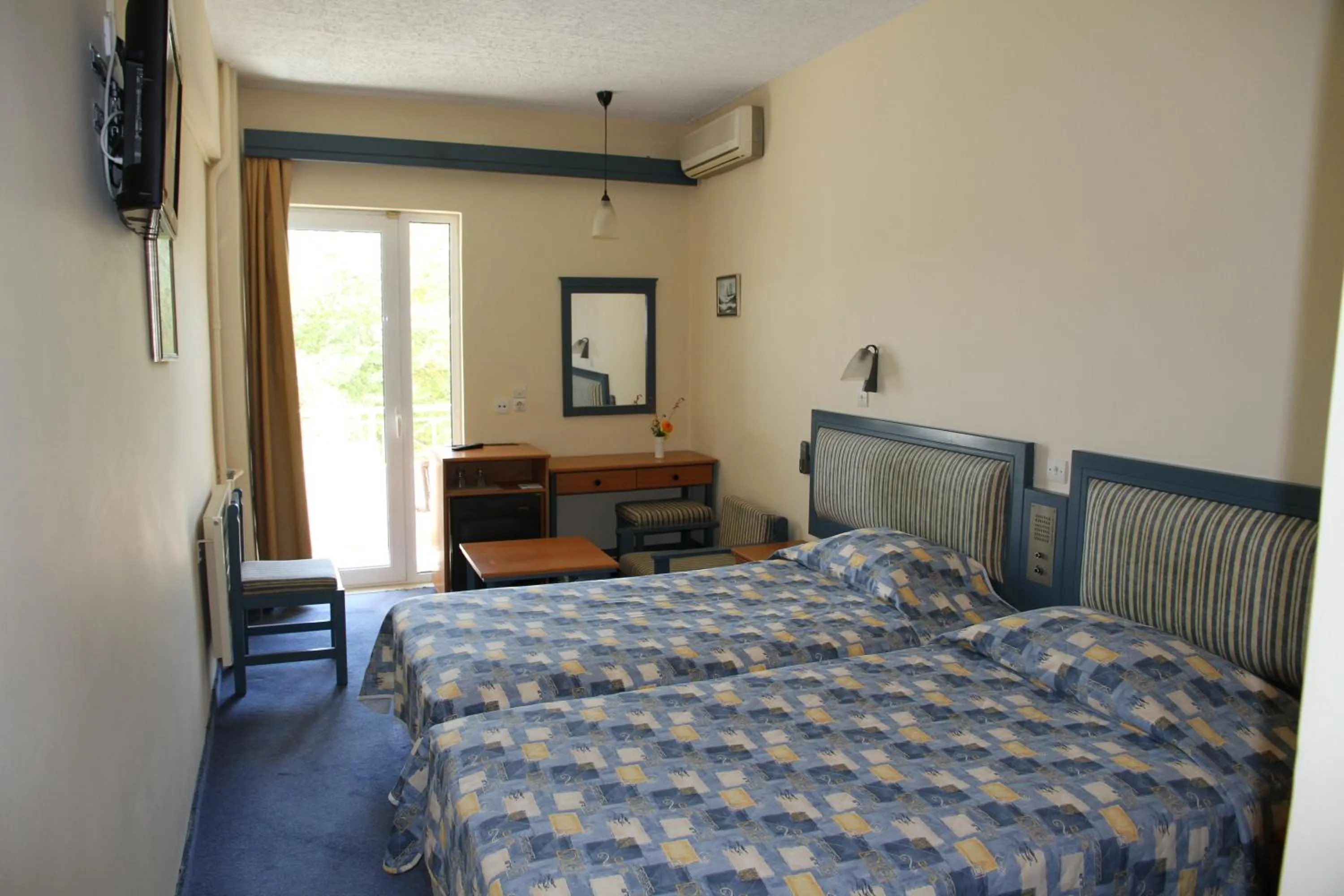 Photo of the whole room, Bed in Astron Hotel