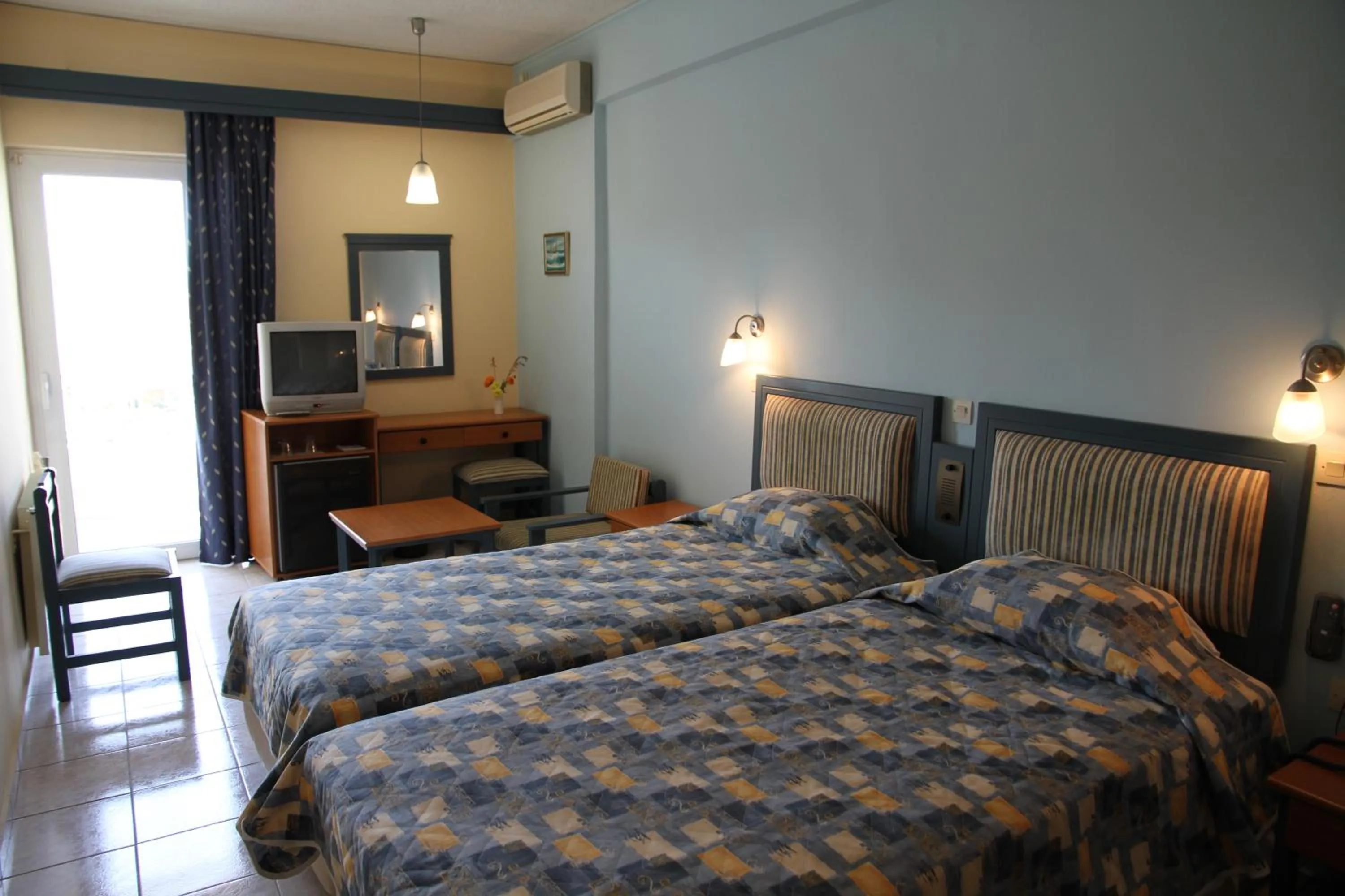 Photo of the whole room, Bed in Astron Hotel