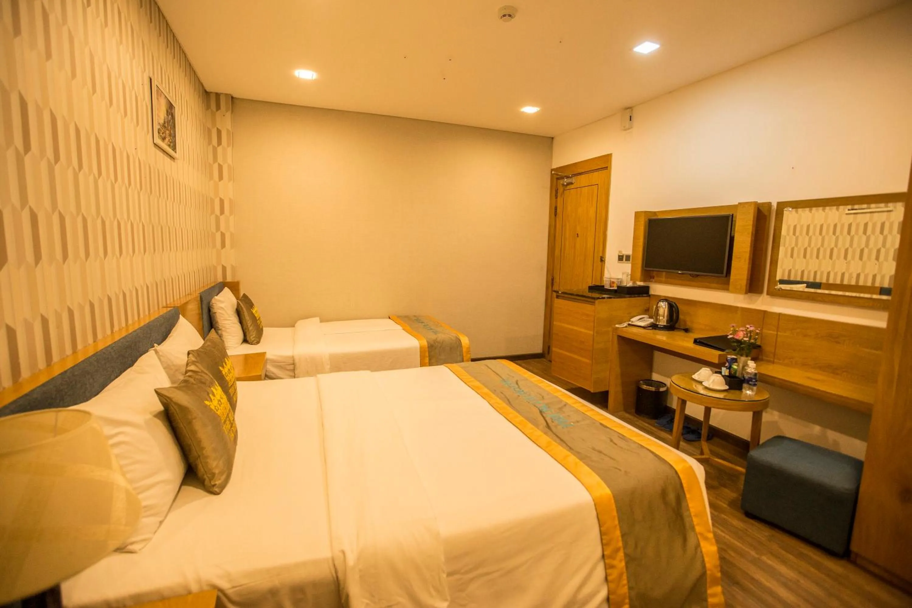 Communal lounge/ TV room, Bed in The Blue Airport Hotel