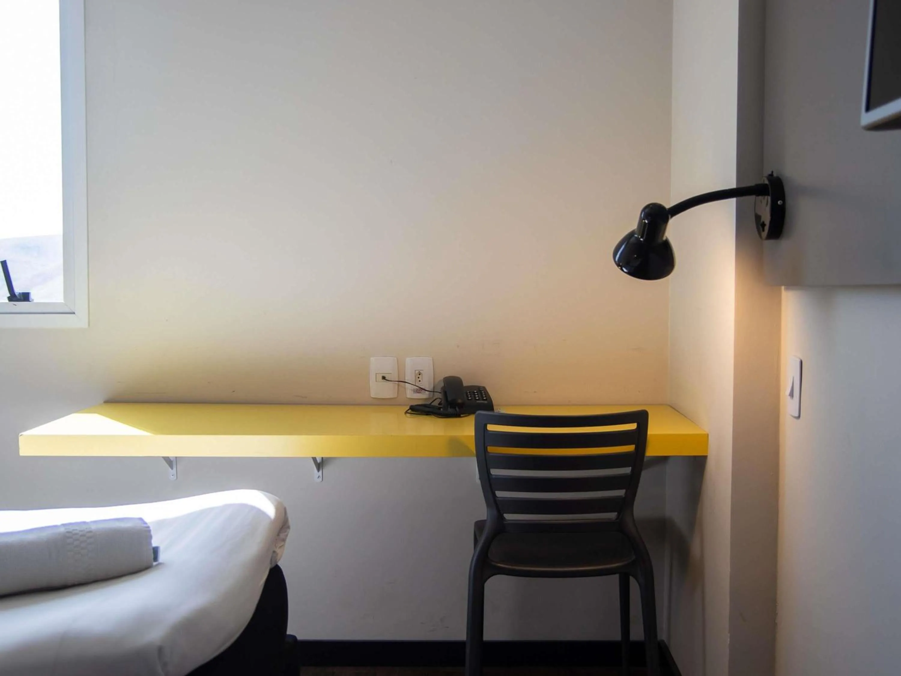 Bedroom in ibis Styles Três Rios