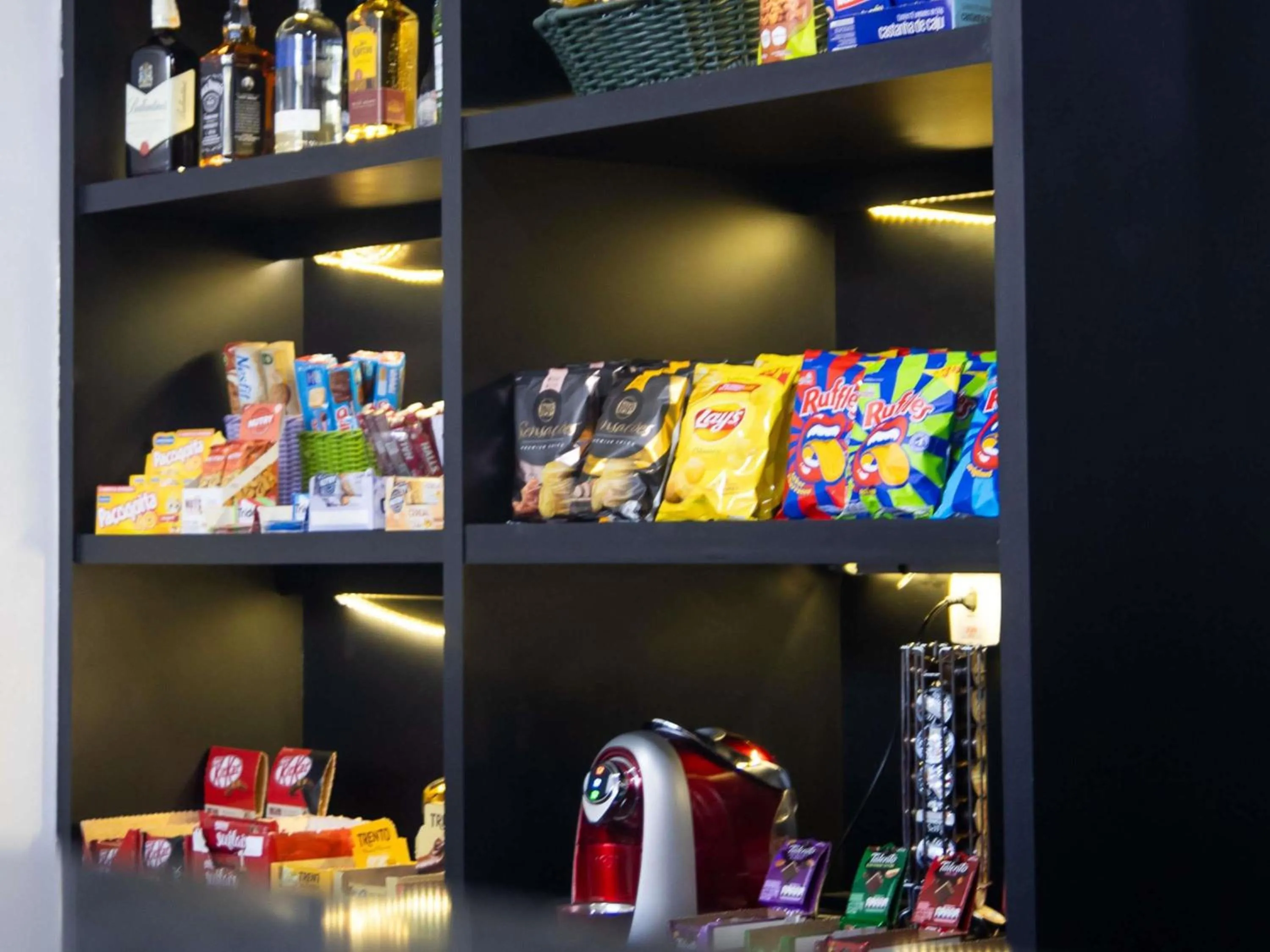 Lounge or bar in ibis Styles Três Rios