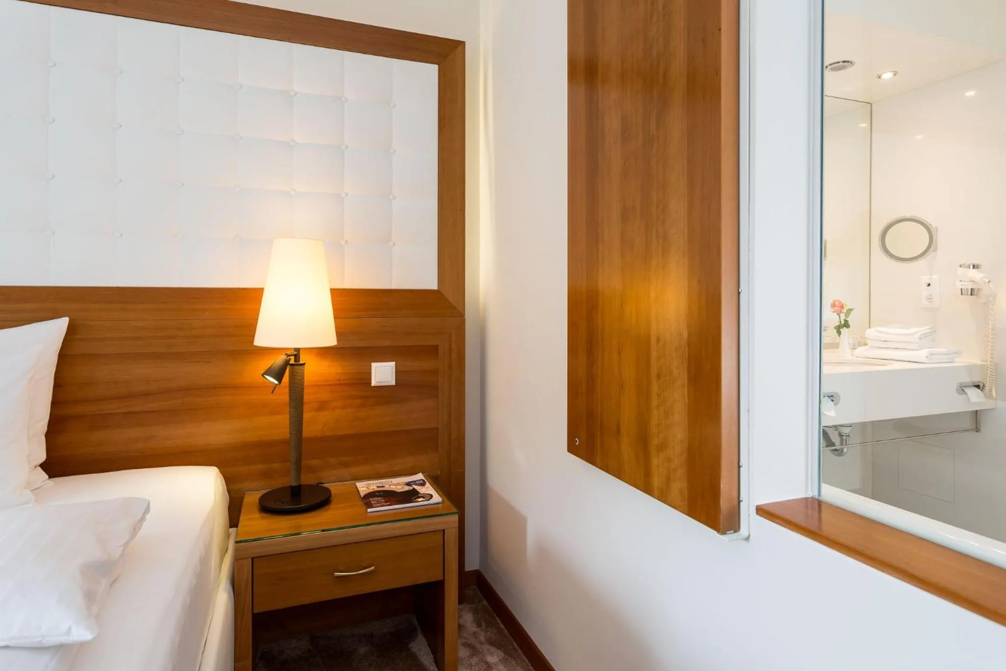 Bathroom, Bed in Hotel & Spa Der Steirerhof