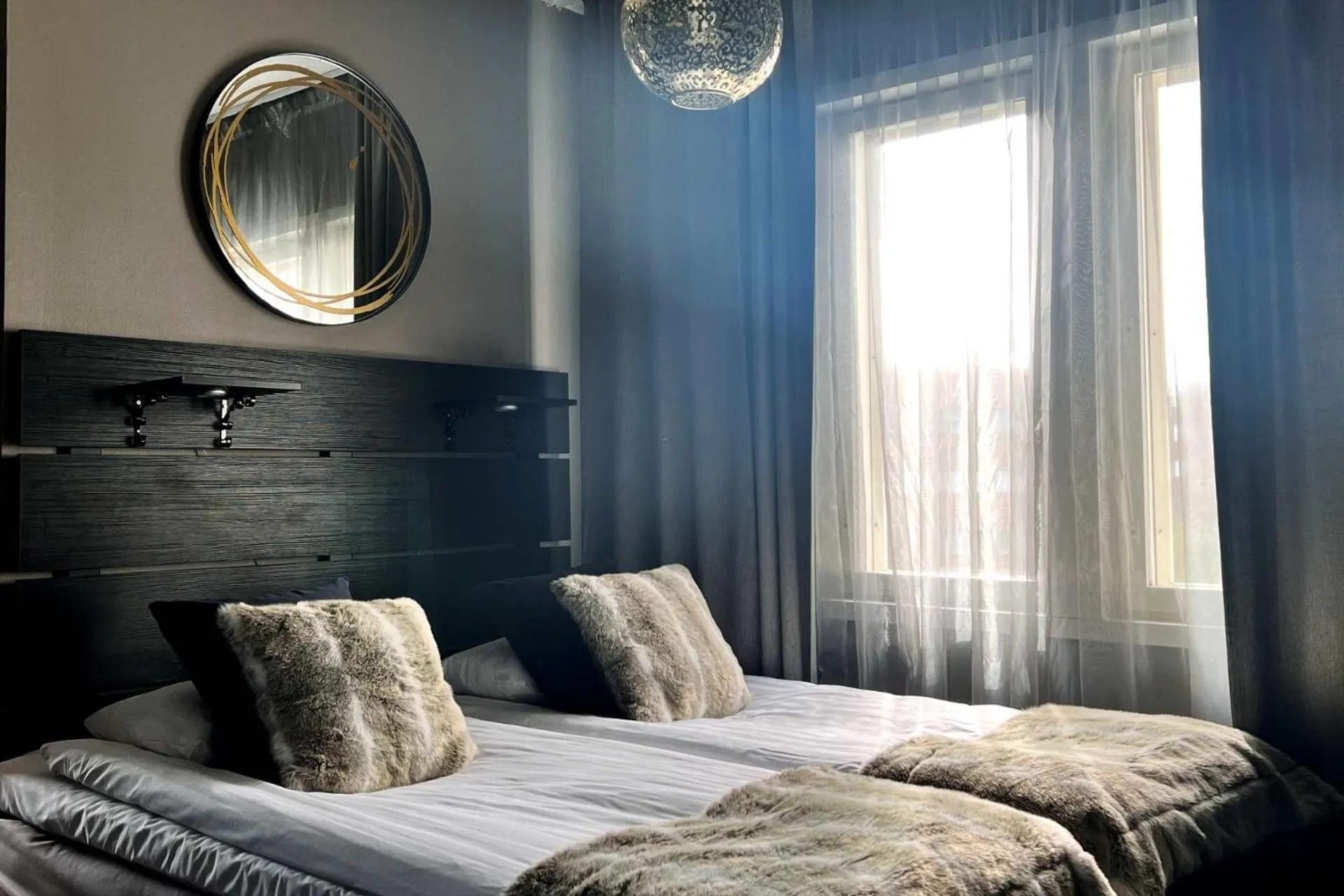 Bed in Hotel Golden Circle Suites