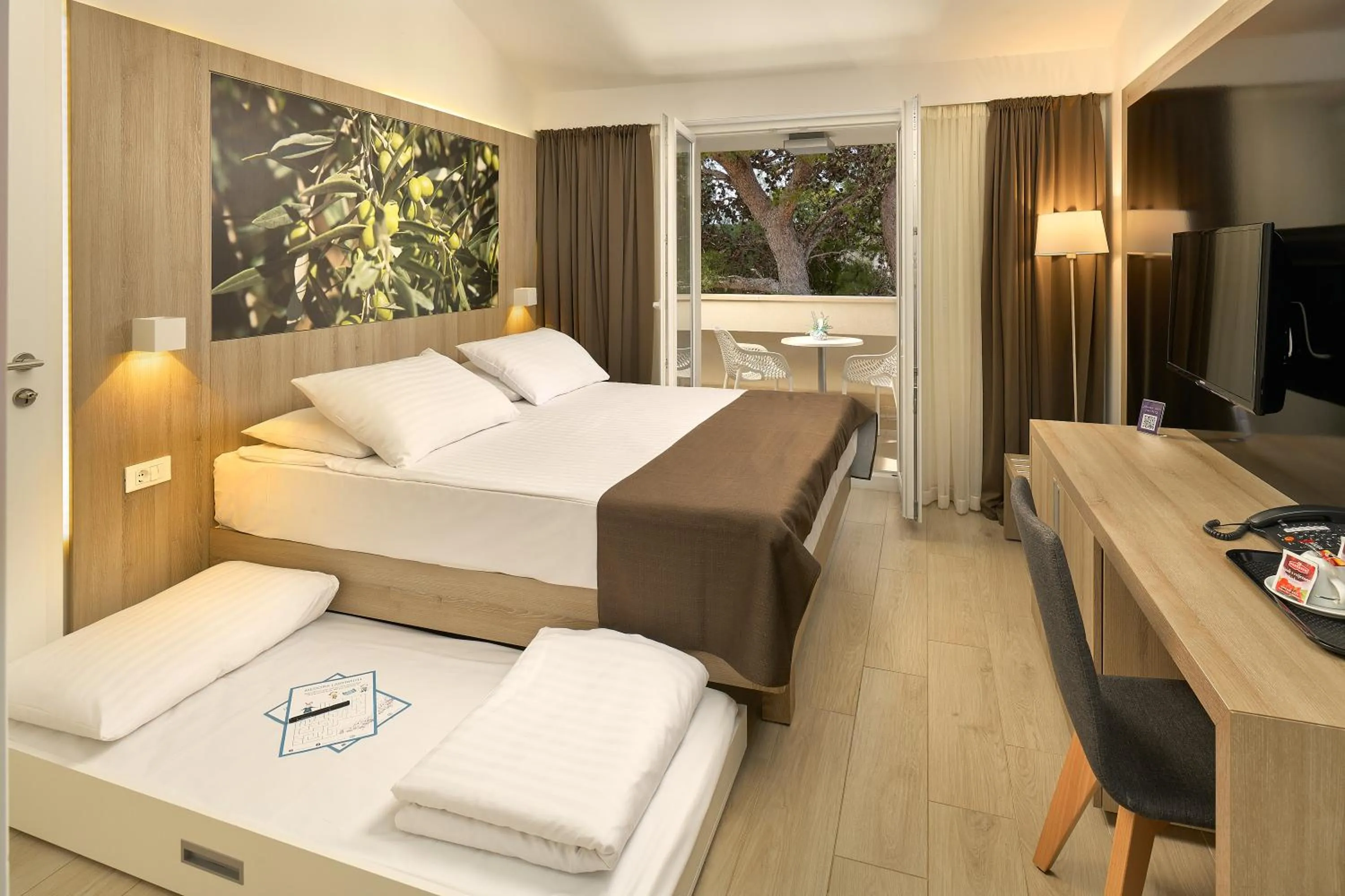 Photo of the whole room, Bed in Medora Auri Family Beach Resort