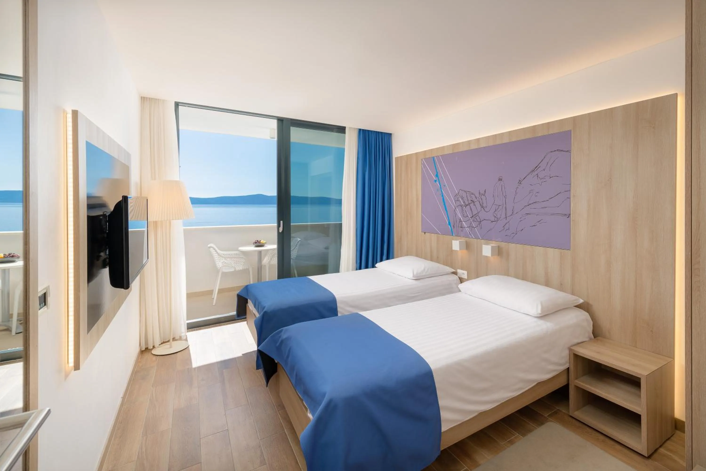 Bed in Medora Auri Family Beach Resort