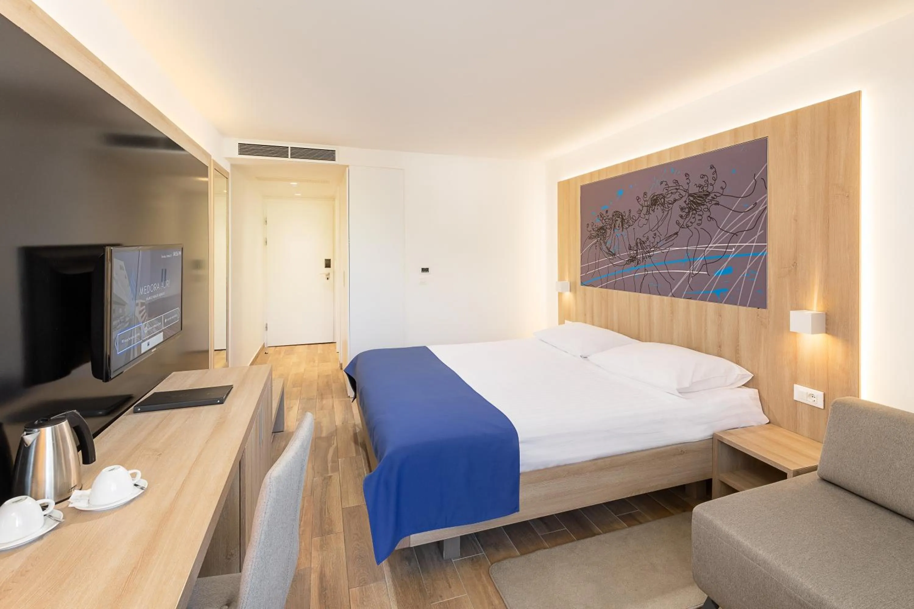 Bed in Medora Auri Family Beach Resort