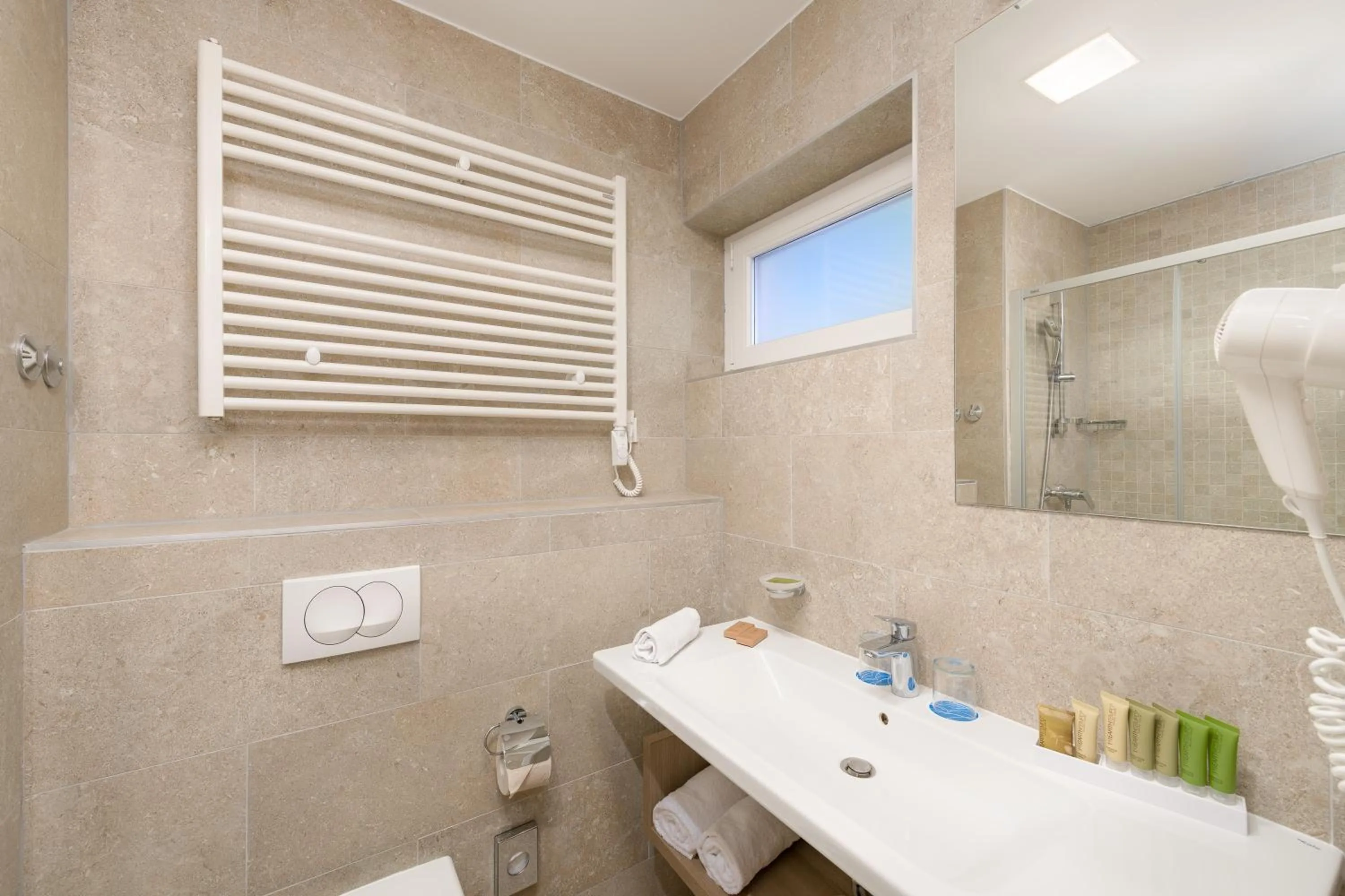 Bathroom in Medora Auri Family Beach Resort
