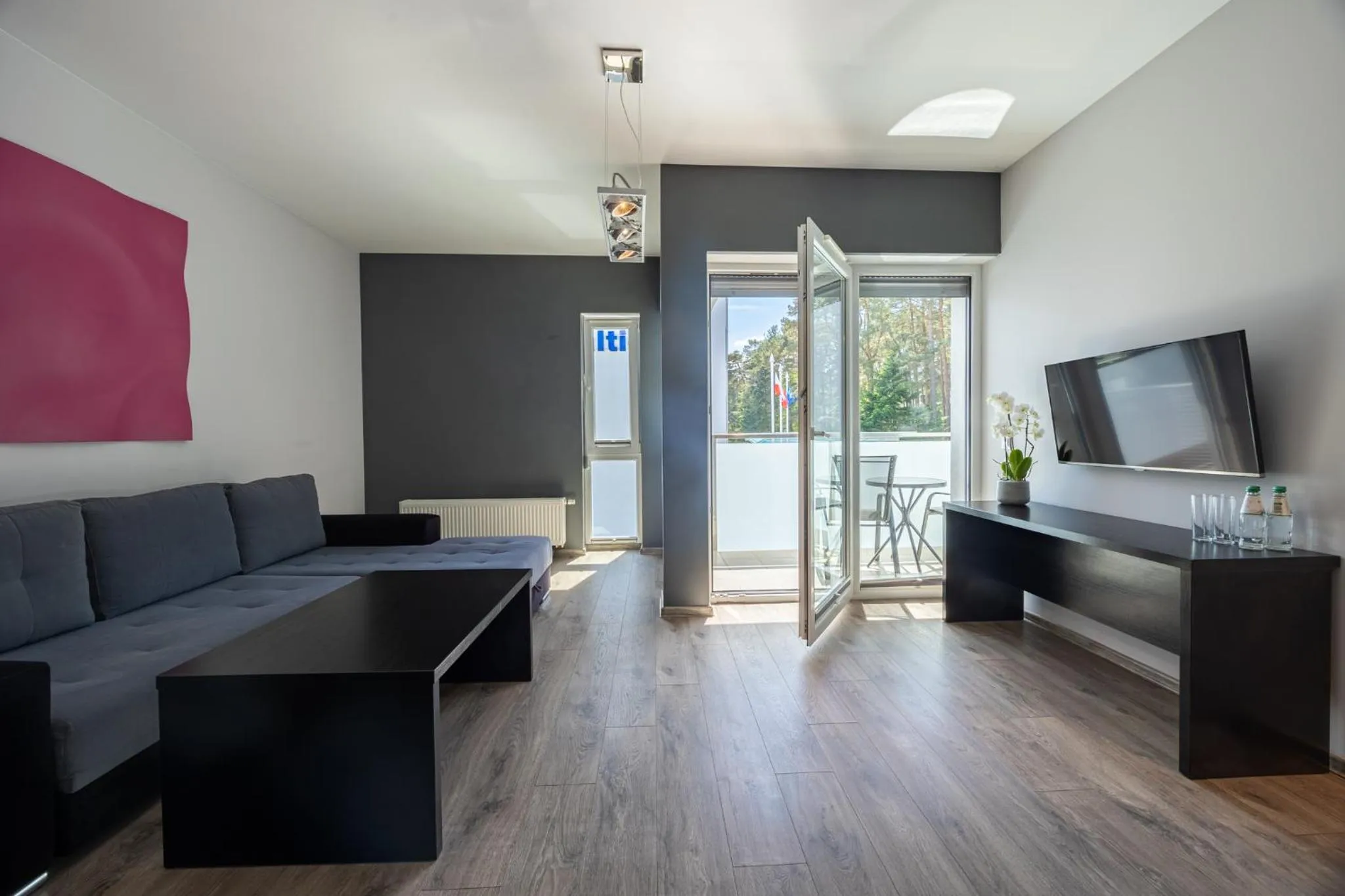 Communal lounge/ TV room in Apartamenty Baltic Inn