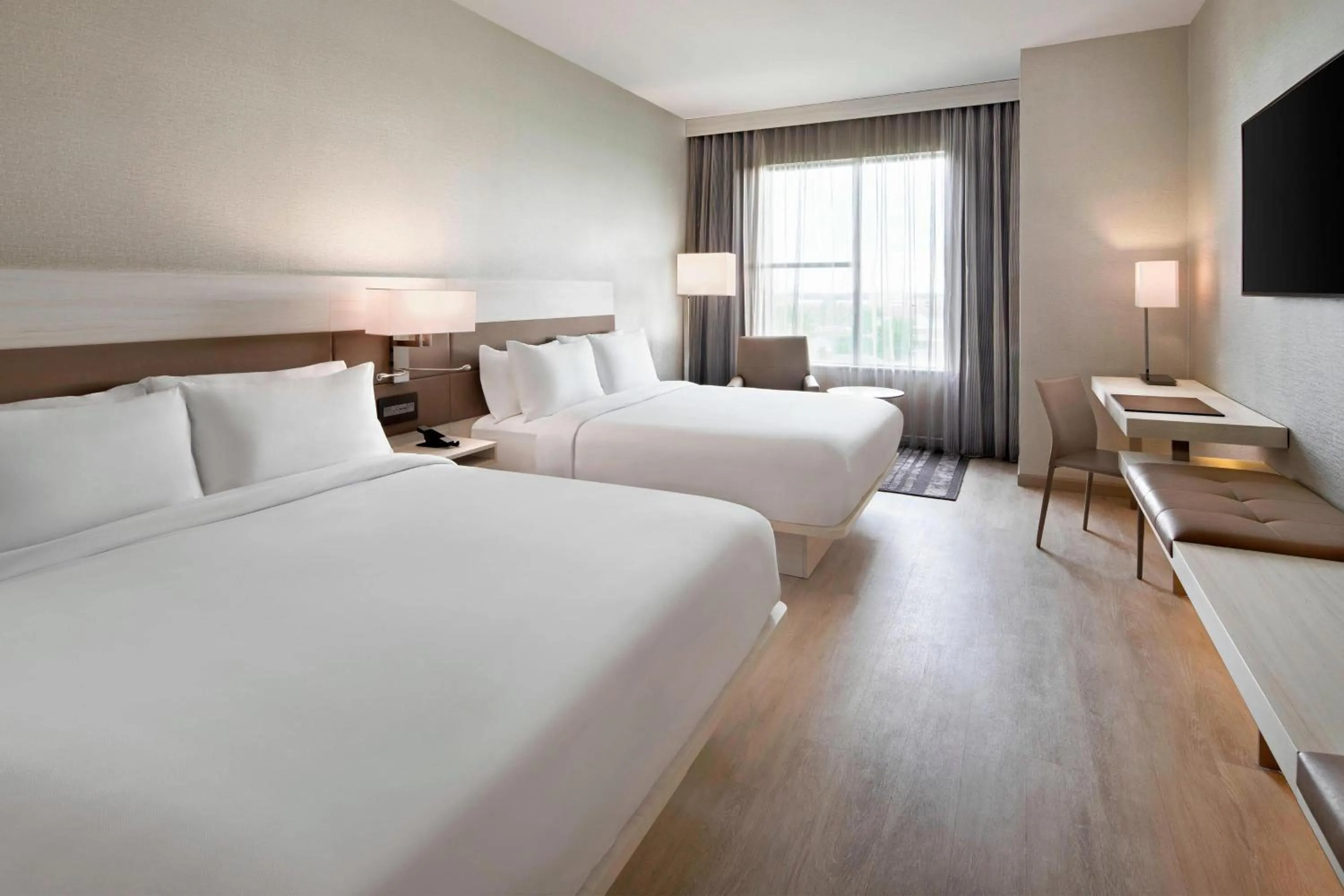 Photo of the whole room, Bed in AC Hotel by Marriott Gainesville Downtown