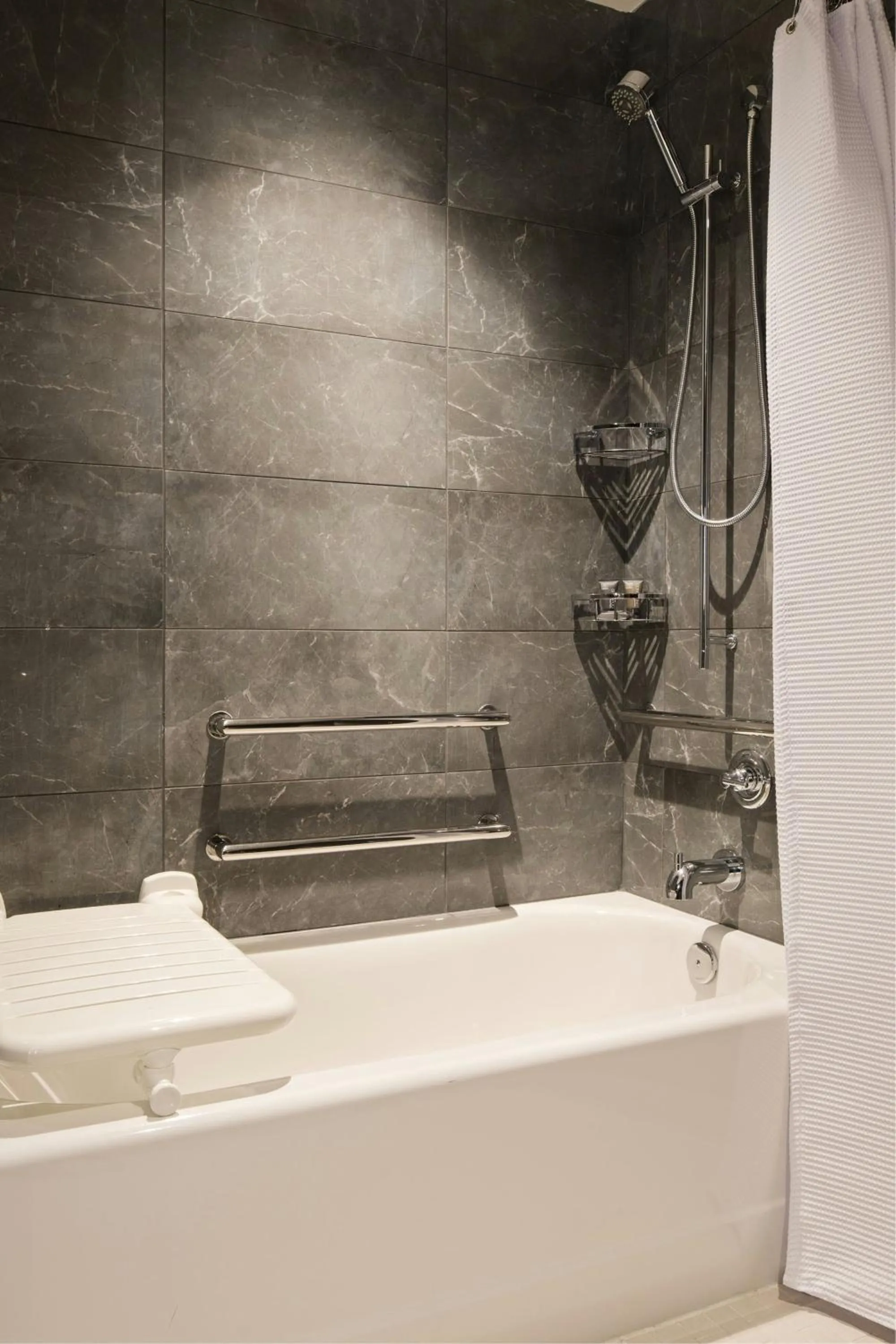 Bathroom in AC Hotel by Marriott Gainesville Downtown