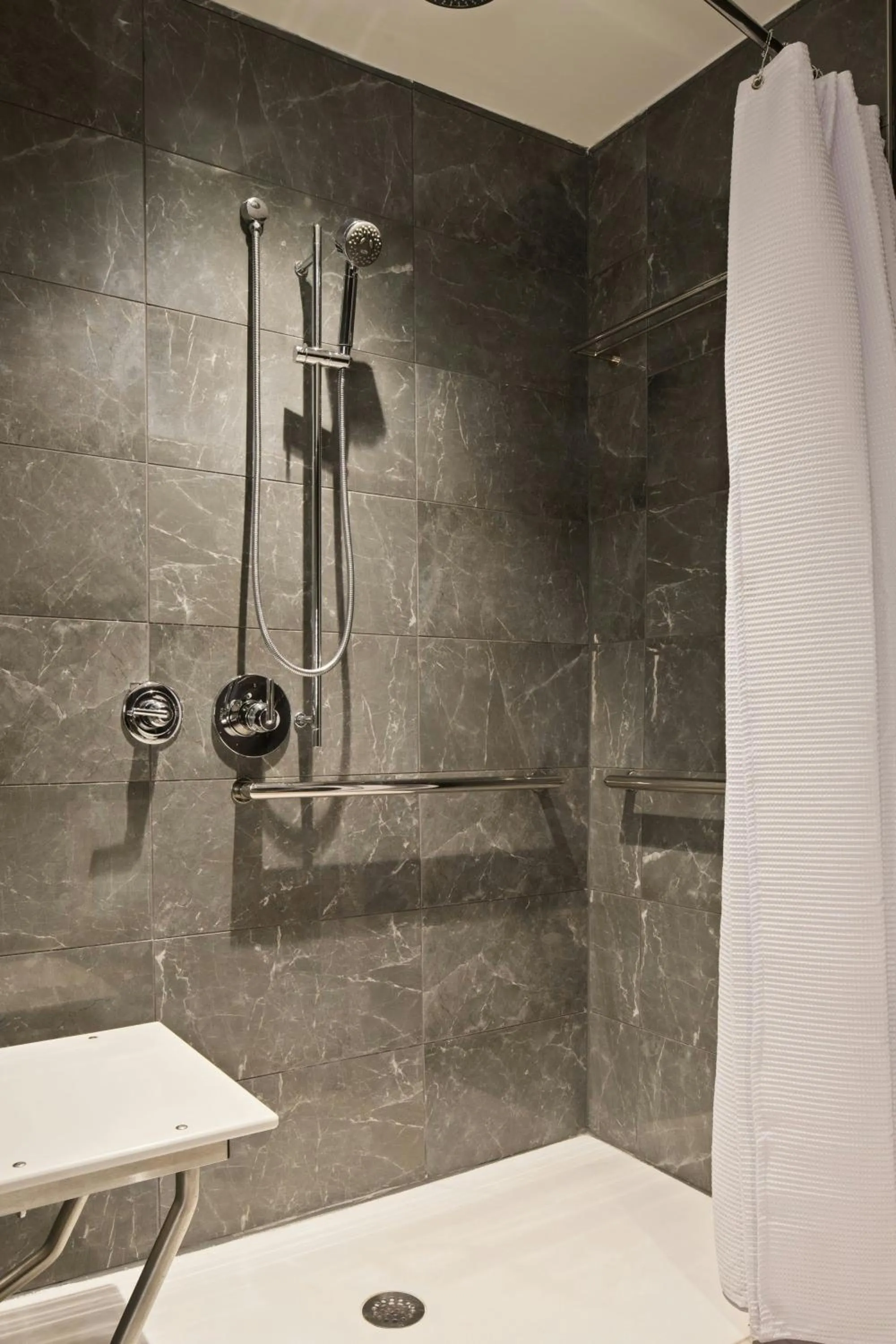 Bathroom in AC Hotel by Marriott Gainesville Downtown