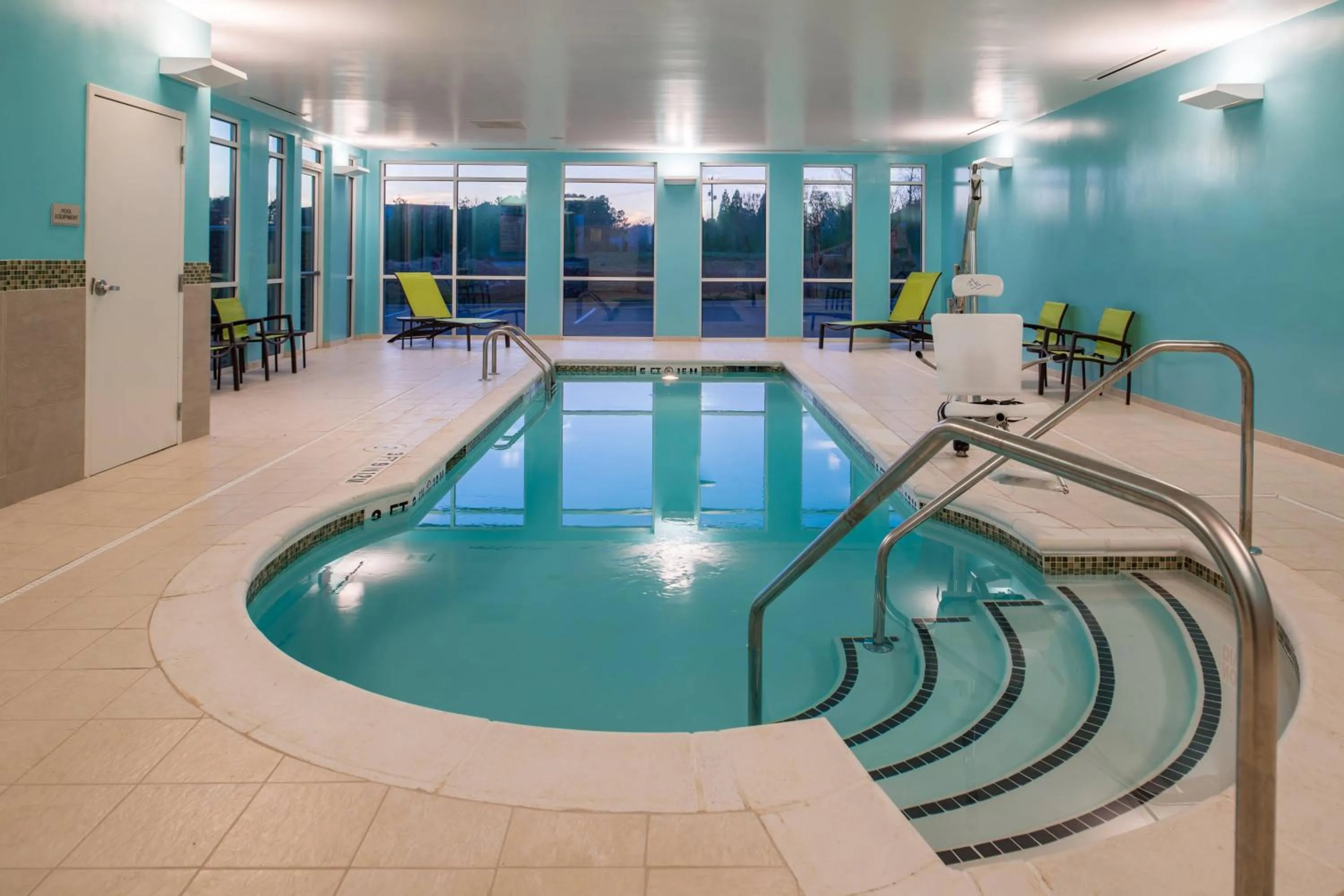 Swimming pool in SpringHill Suites by Marriott Greensboro Airport