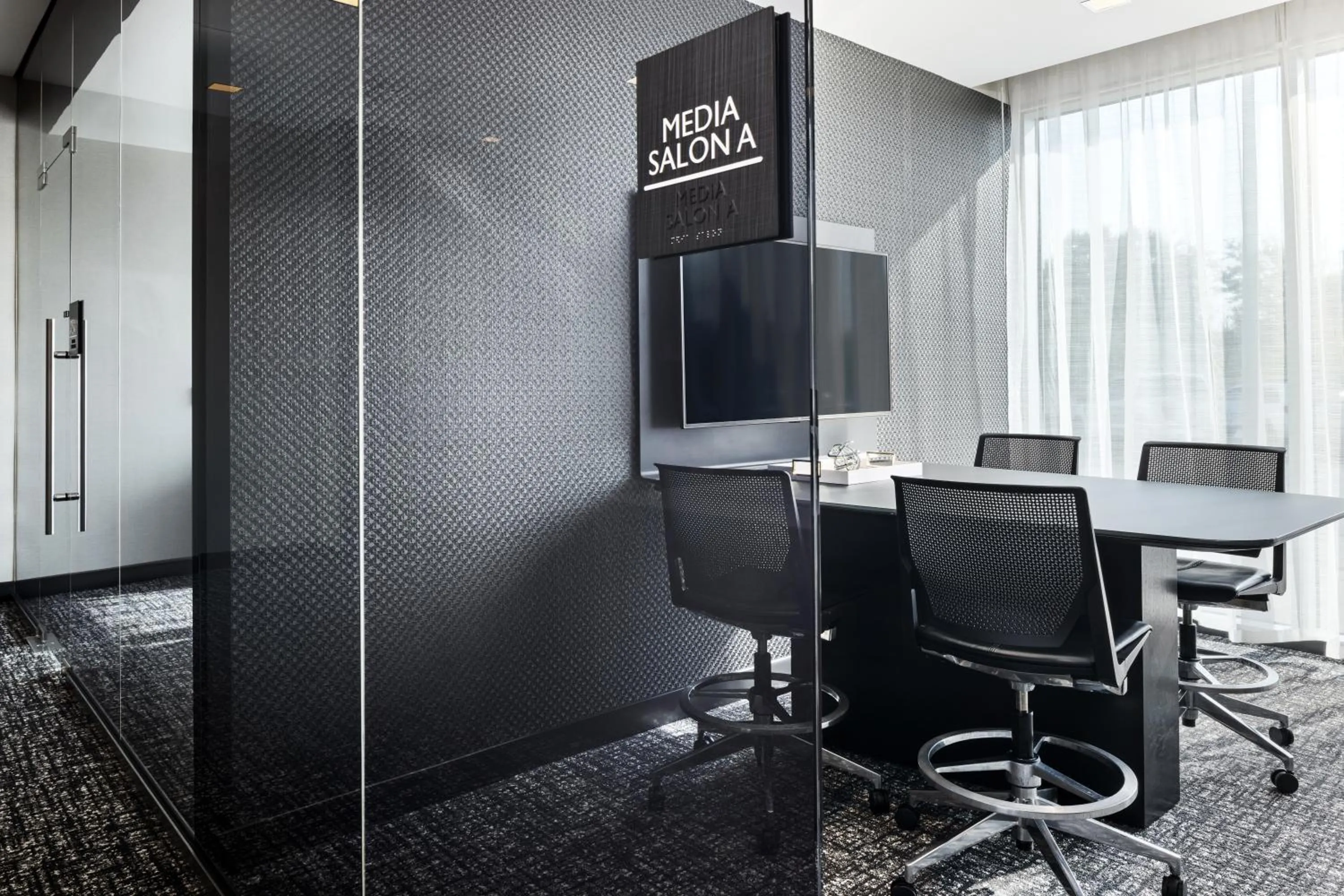 TV and multimedia in AC Hotel by Marriott Minneapolis West End