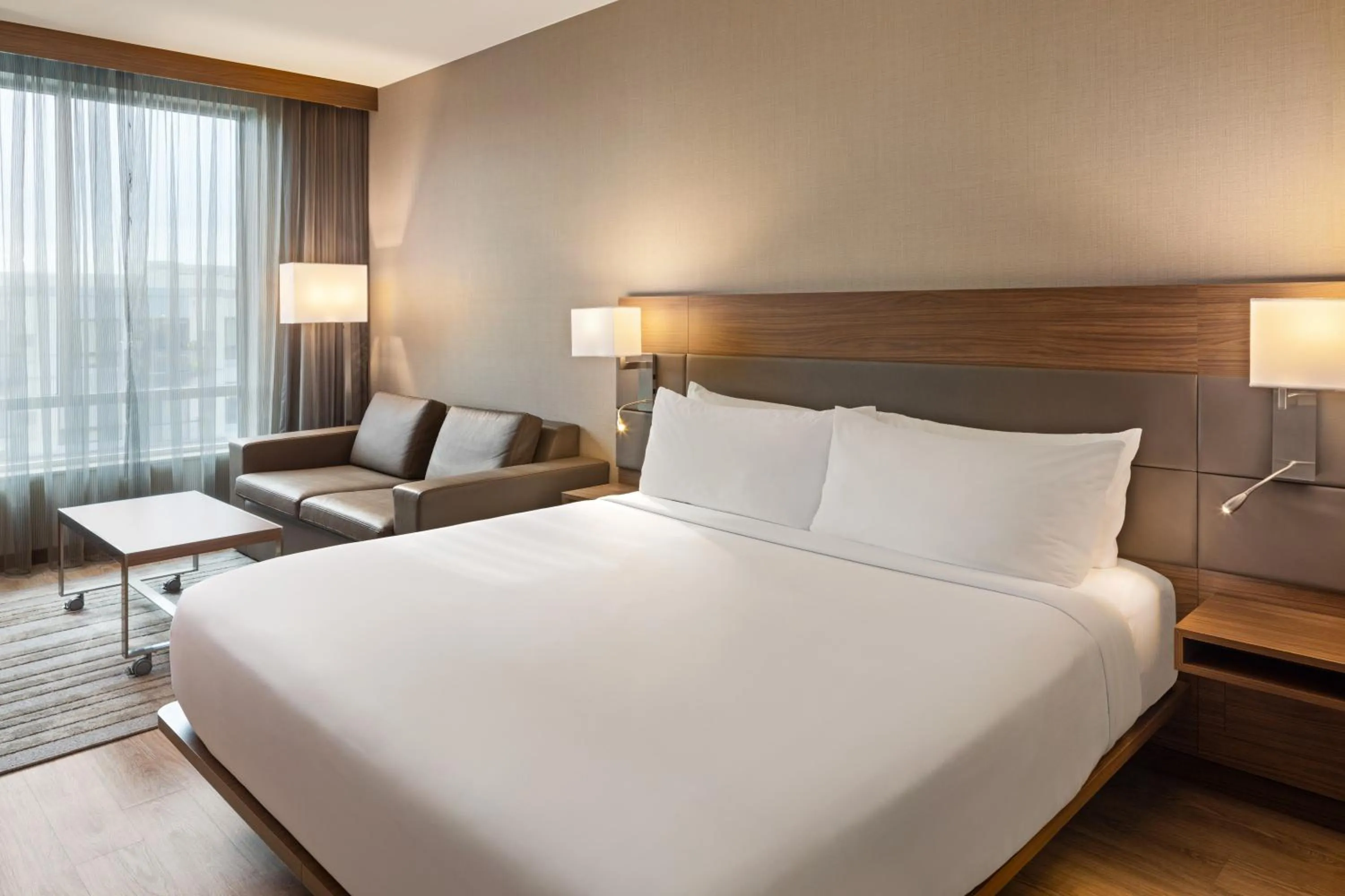 Seating area, Bed in AC Hotel by Marriott Minneapolis West End