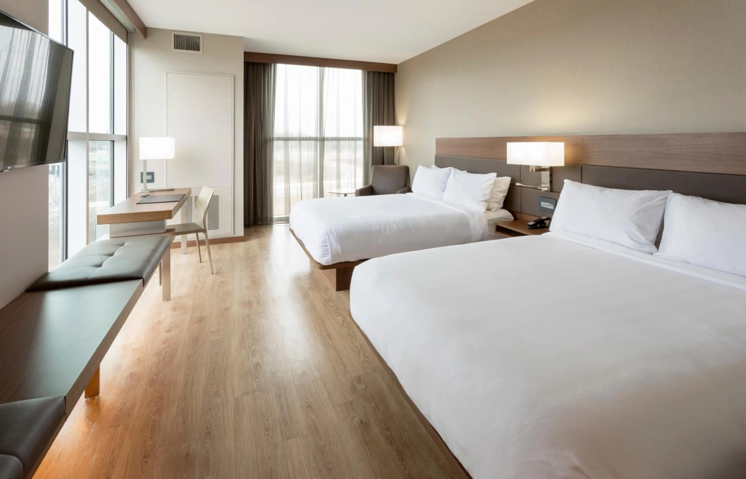 Bed in AC Hotel by Marriott Minneapolis West End