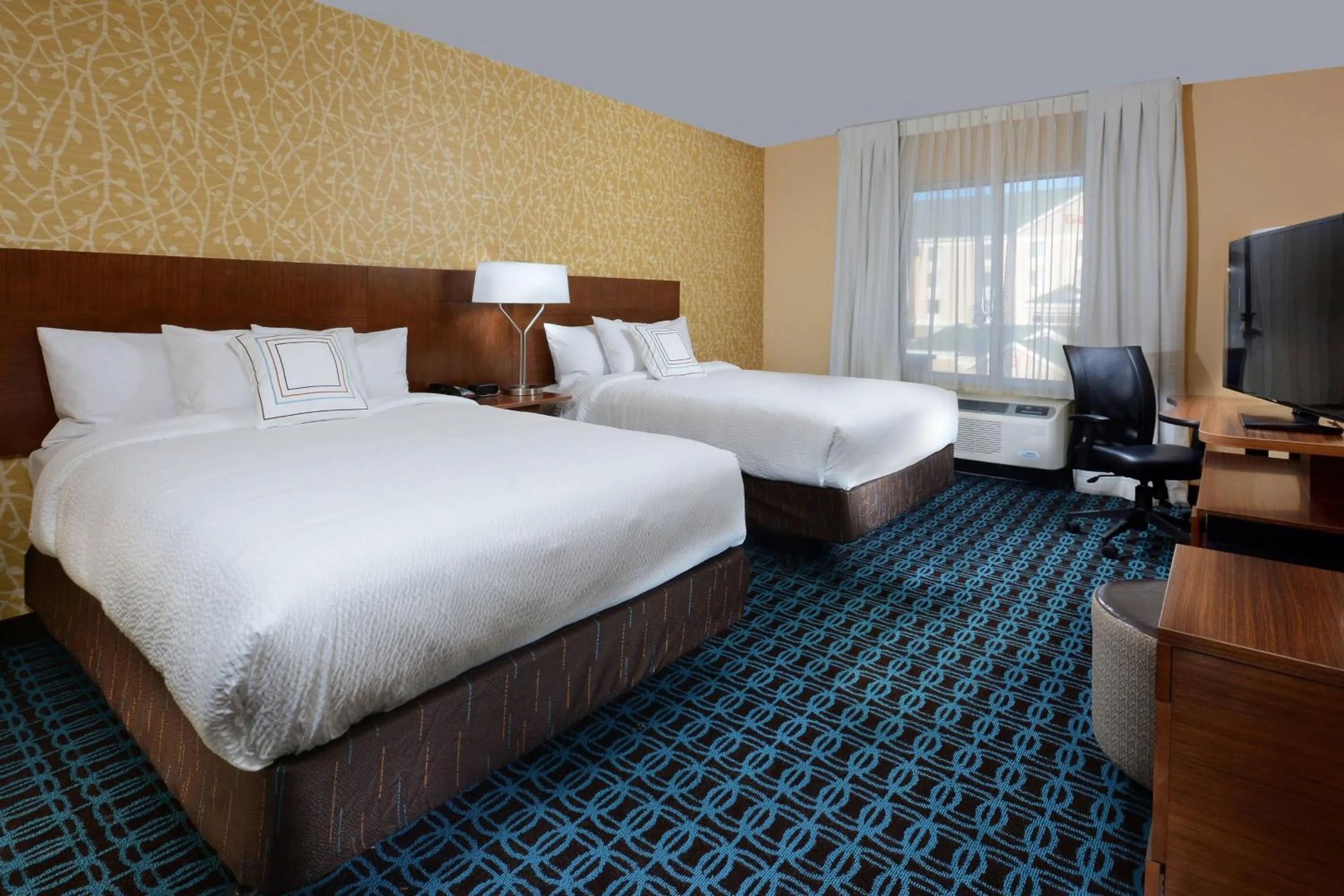 Photo of the whole room, Bed in Fairfield Inn & Suites by Marriott Raleigh Capital Blvd./I-540