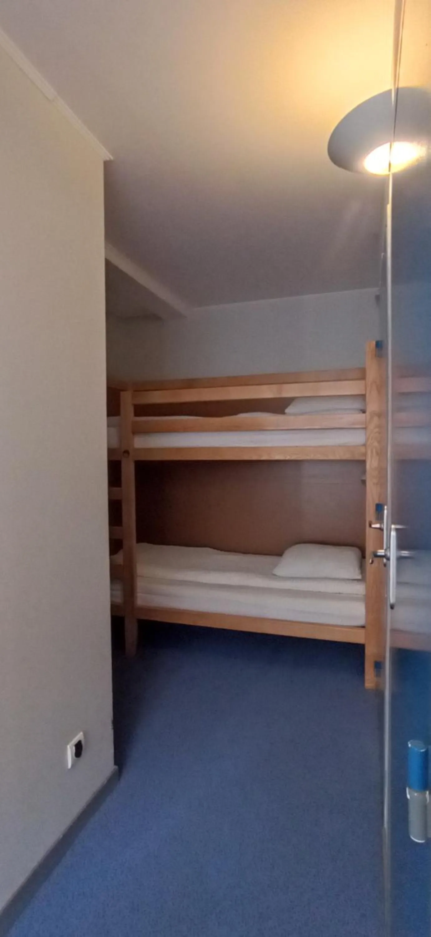 Bed in Logis Hotel Restaurant Le Cygne