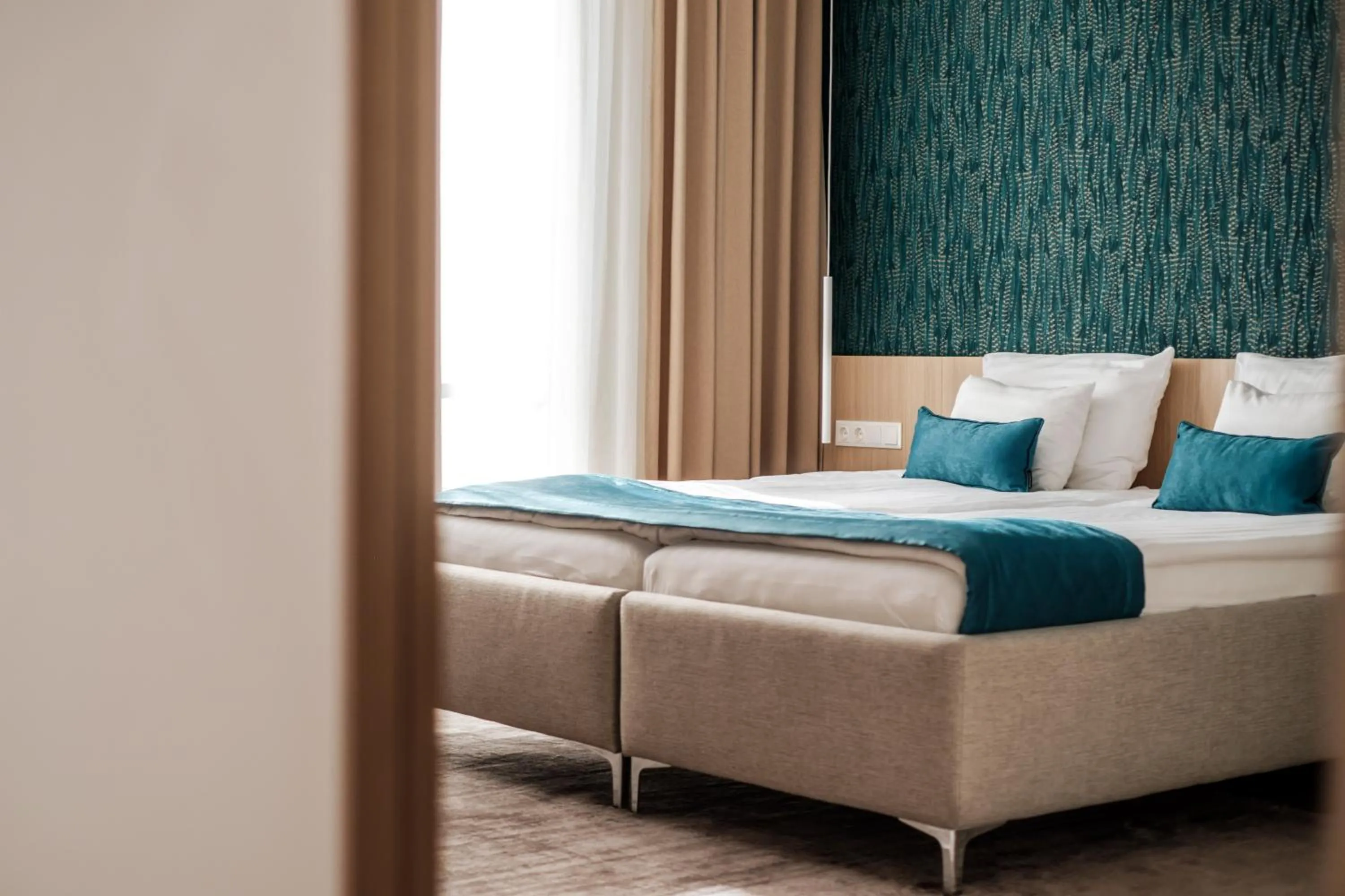 Bed in Adele Apartments