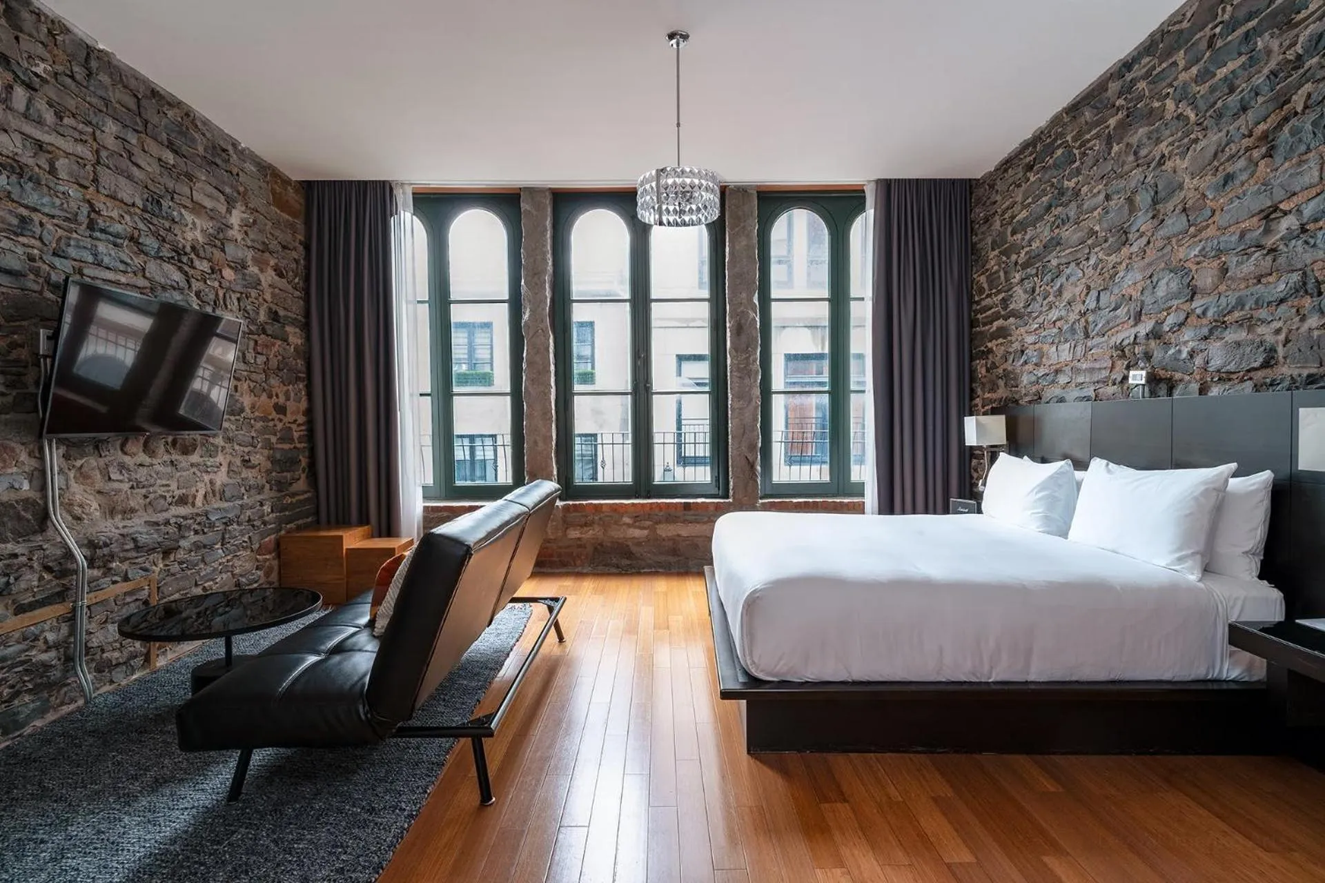Photo of the whole room, Bed in Le Petit Hôtel Vieux-Montréal - Saint-Paul by Gray Collection