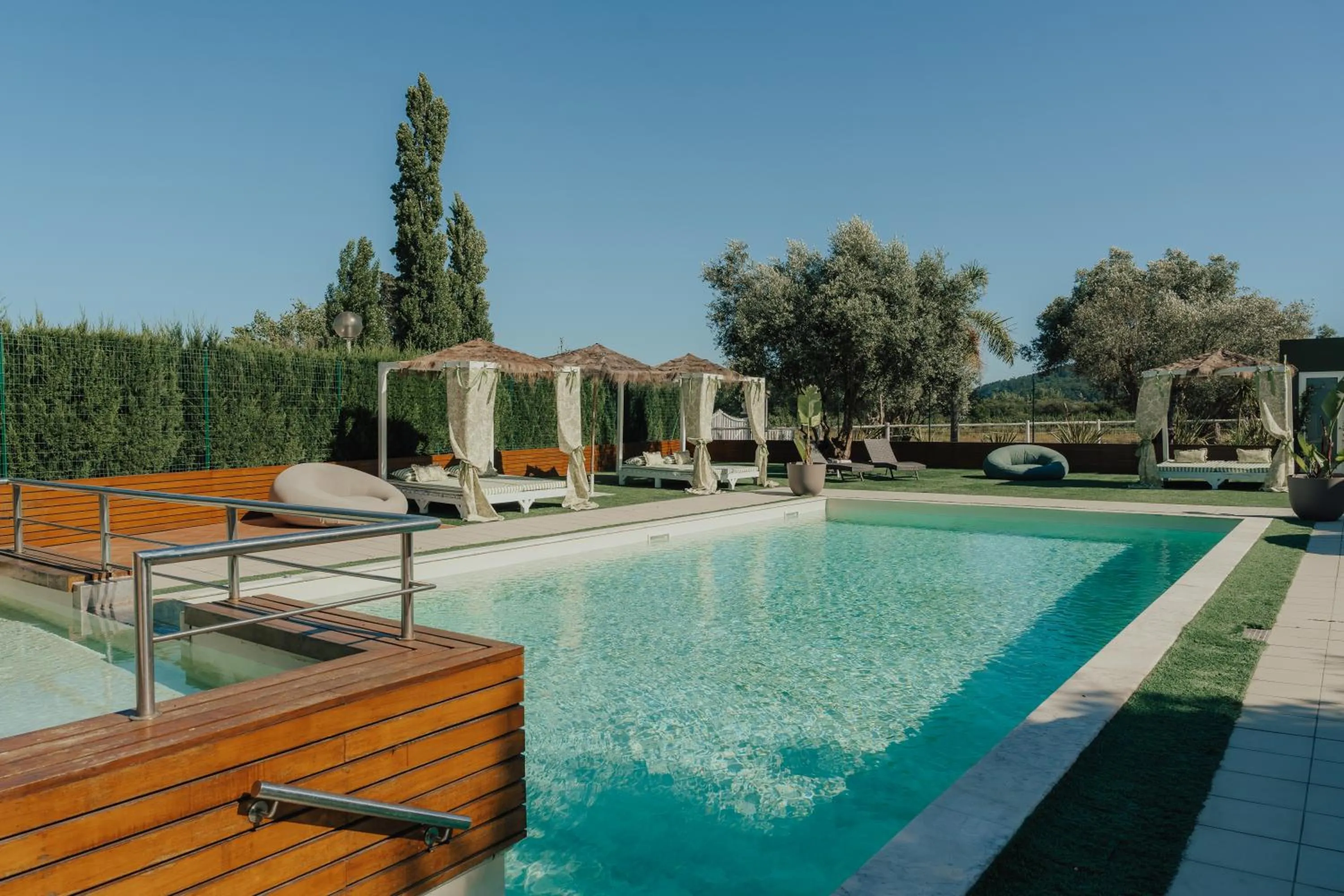 Swimming pool in Quinta do Pinheiro Hotel E Eventos by Grupo Quinta dos Lagos
