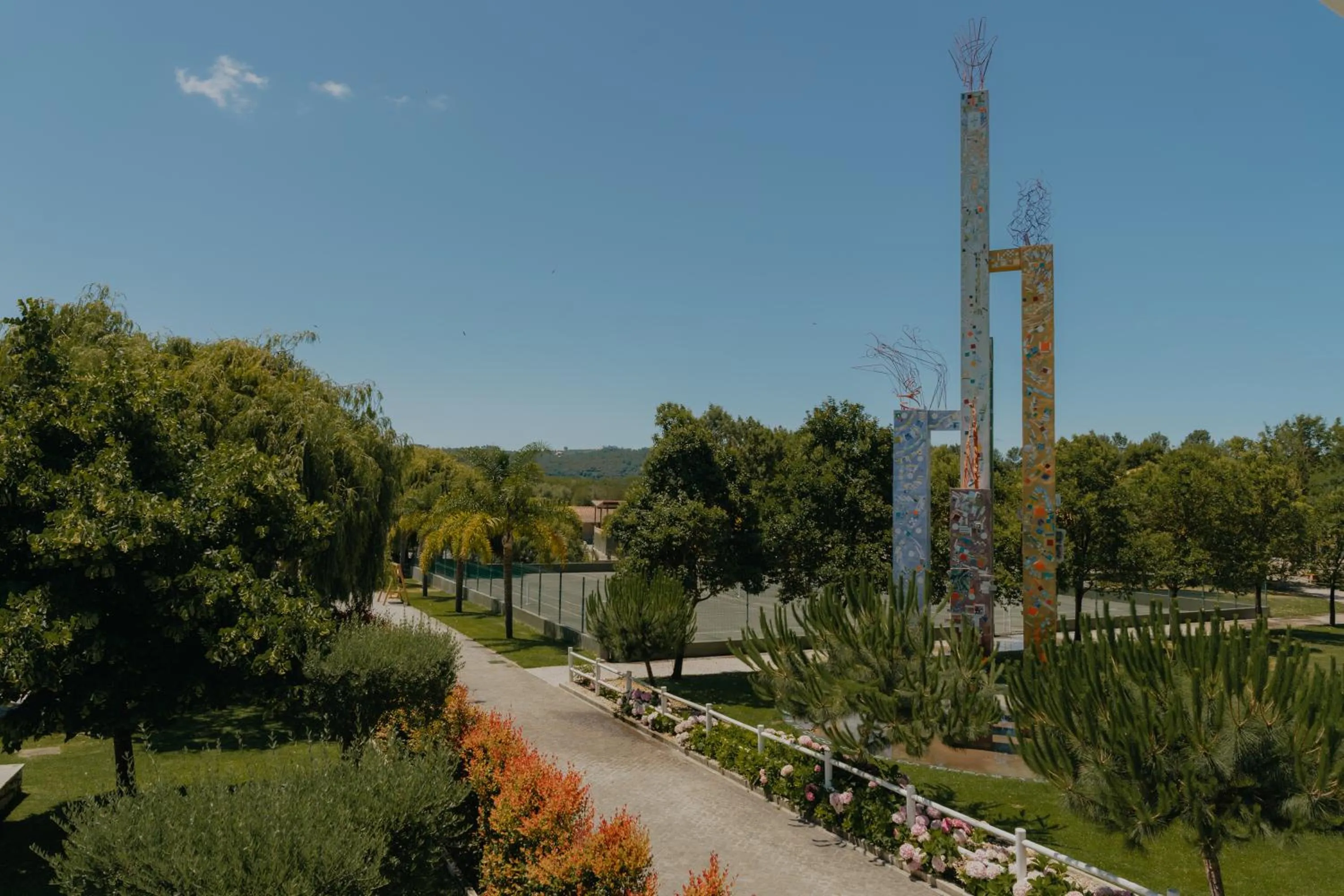 Garden in Quinta do Pinheiro Hotel E Eventos by Grupo Quinta dos Lagos