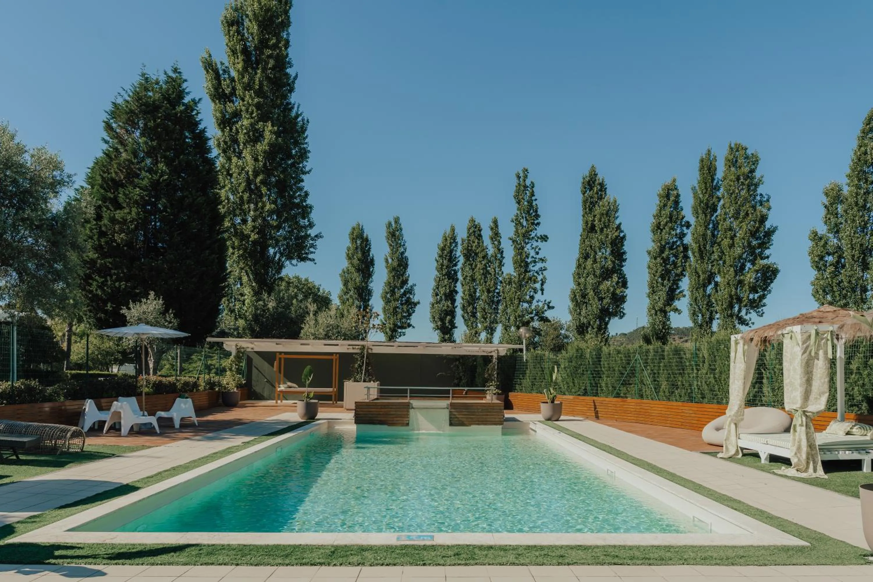 Swimming pool in Quinta do Pinheiro Hotel E Eventos by Grupo Quinta dos Lagos