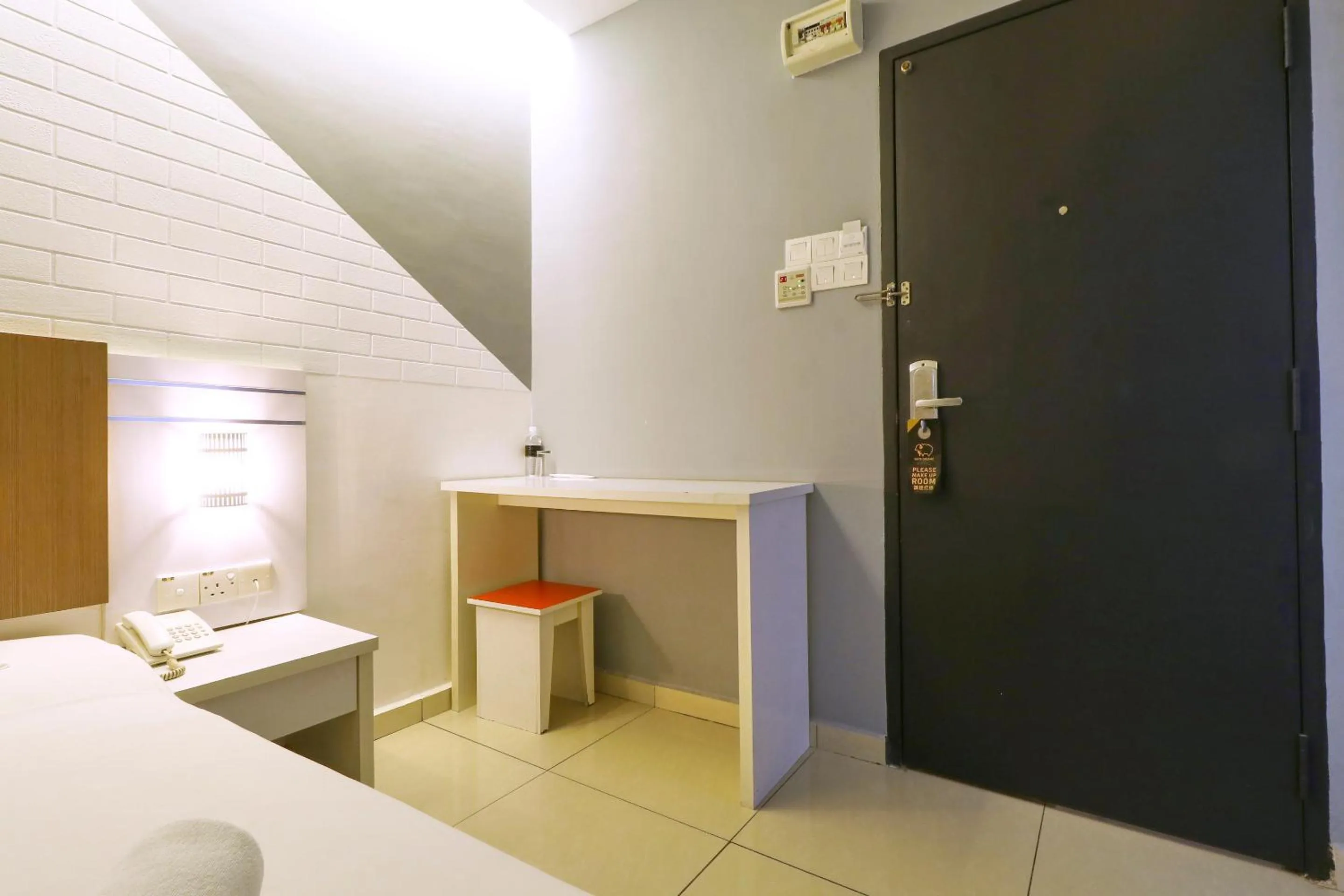 Seating area, Bed in Suite Dreamz Hotel