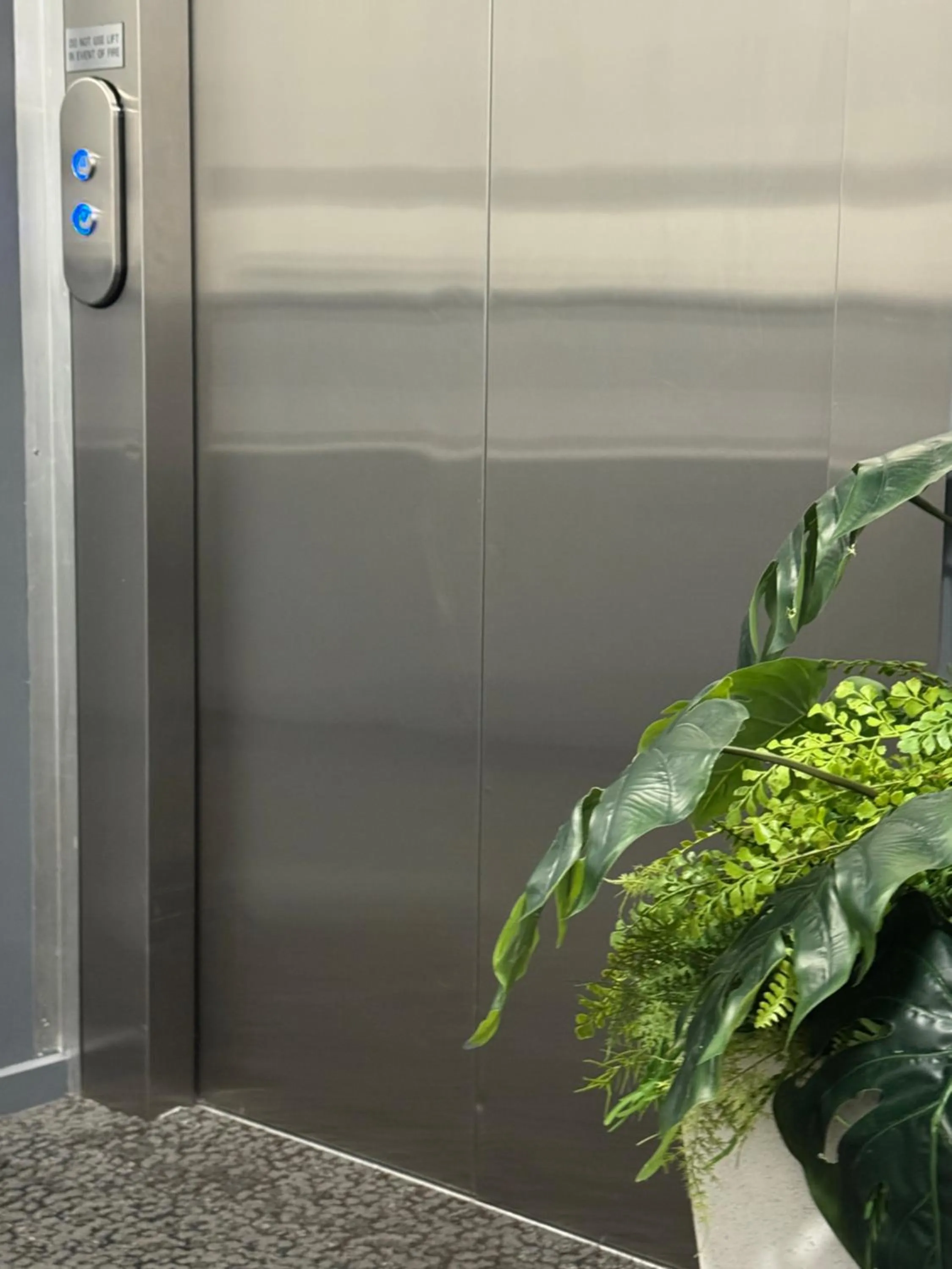 elevator in Quest Henderson, Auckland Apartment Hotel