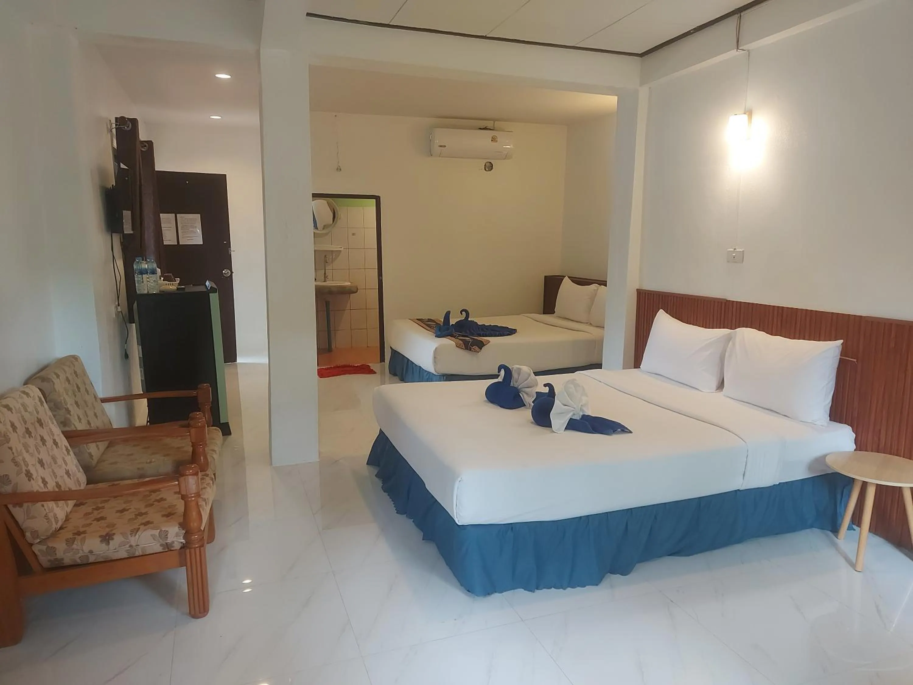 Bed in Blue Andaman Lanta Resort