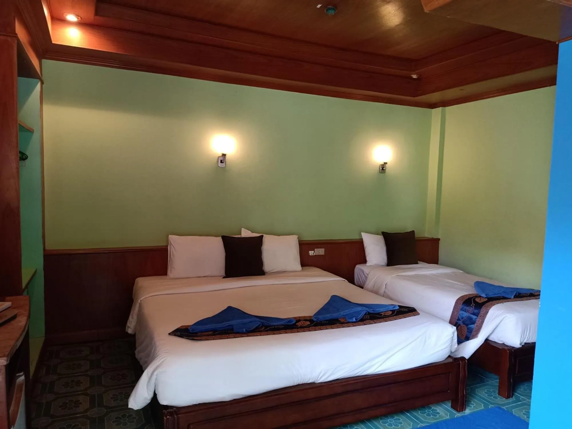 Bed in Blue Andaman Lanta Resort