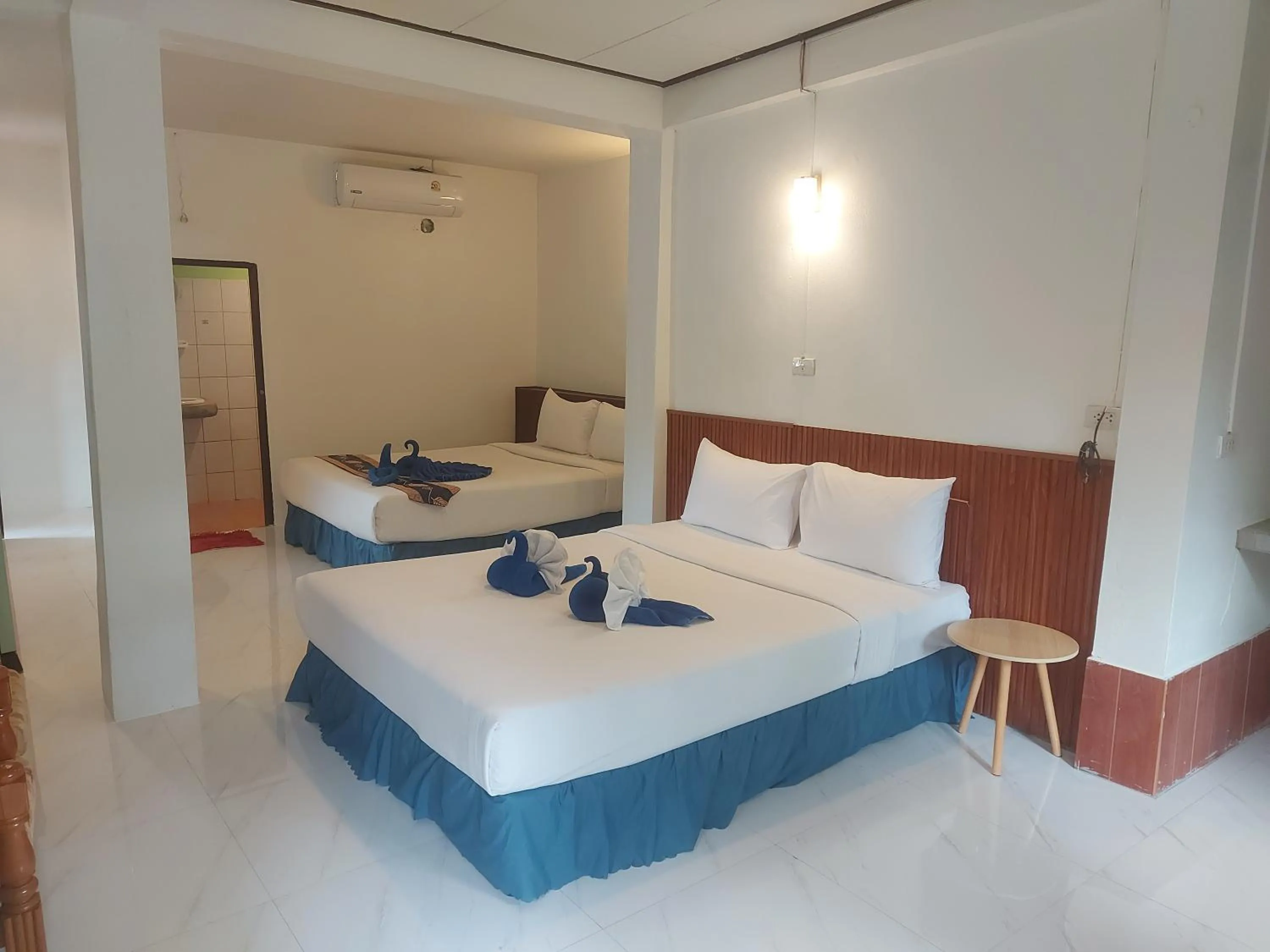 Bed in Blue Andaman Lanta Resort