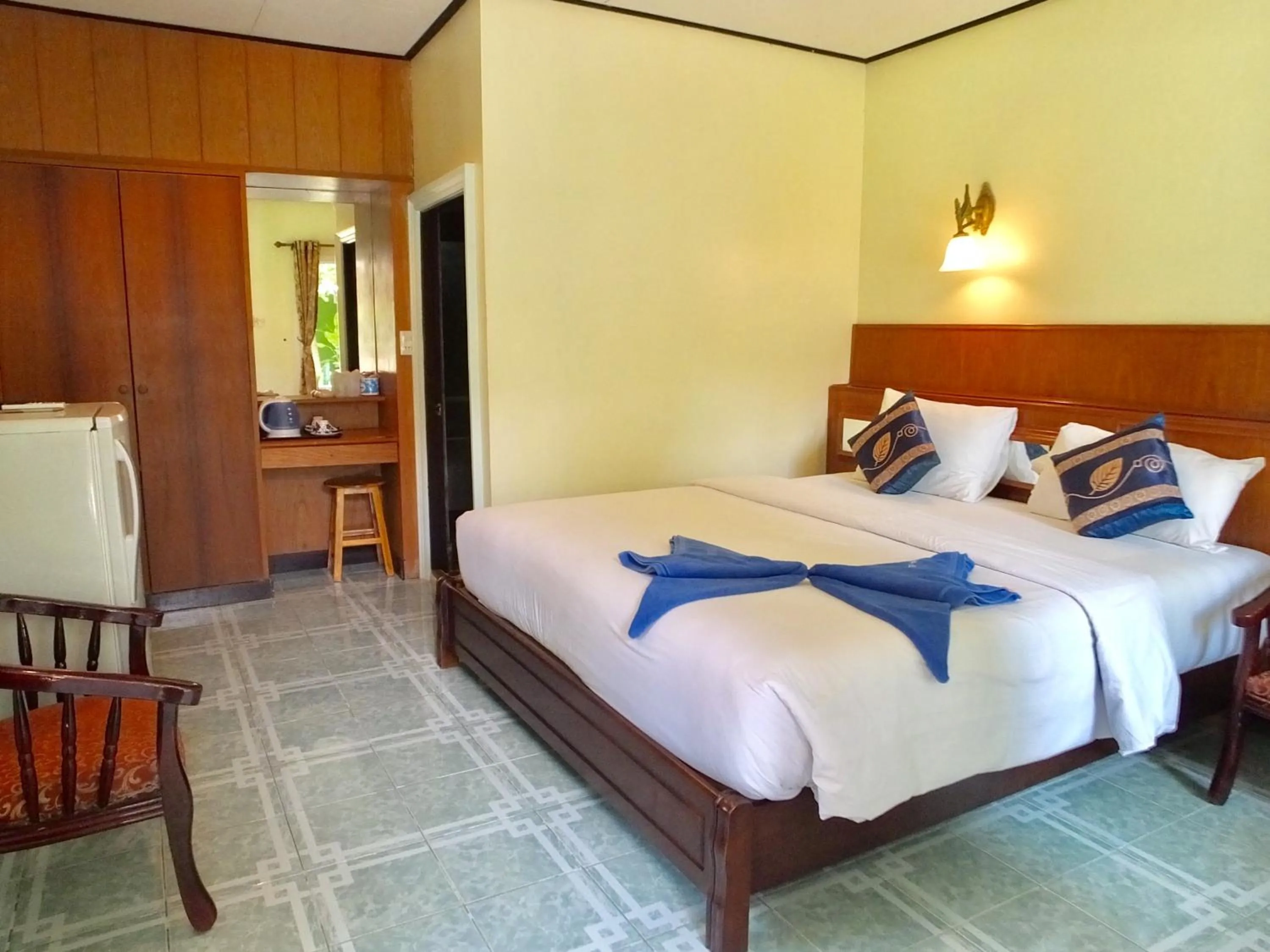 Bed in Blue Andaman Lanta Resort