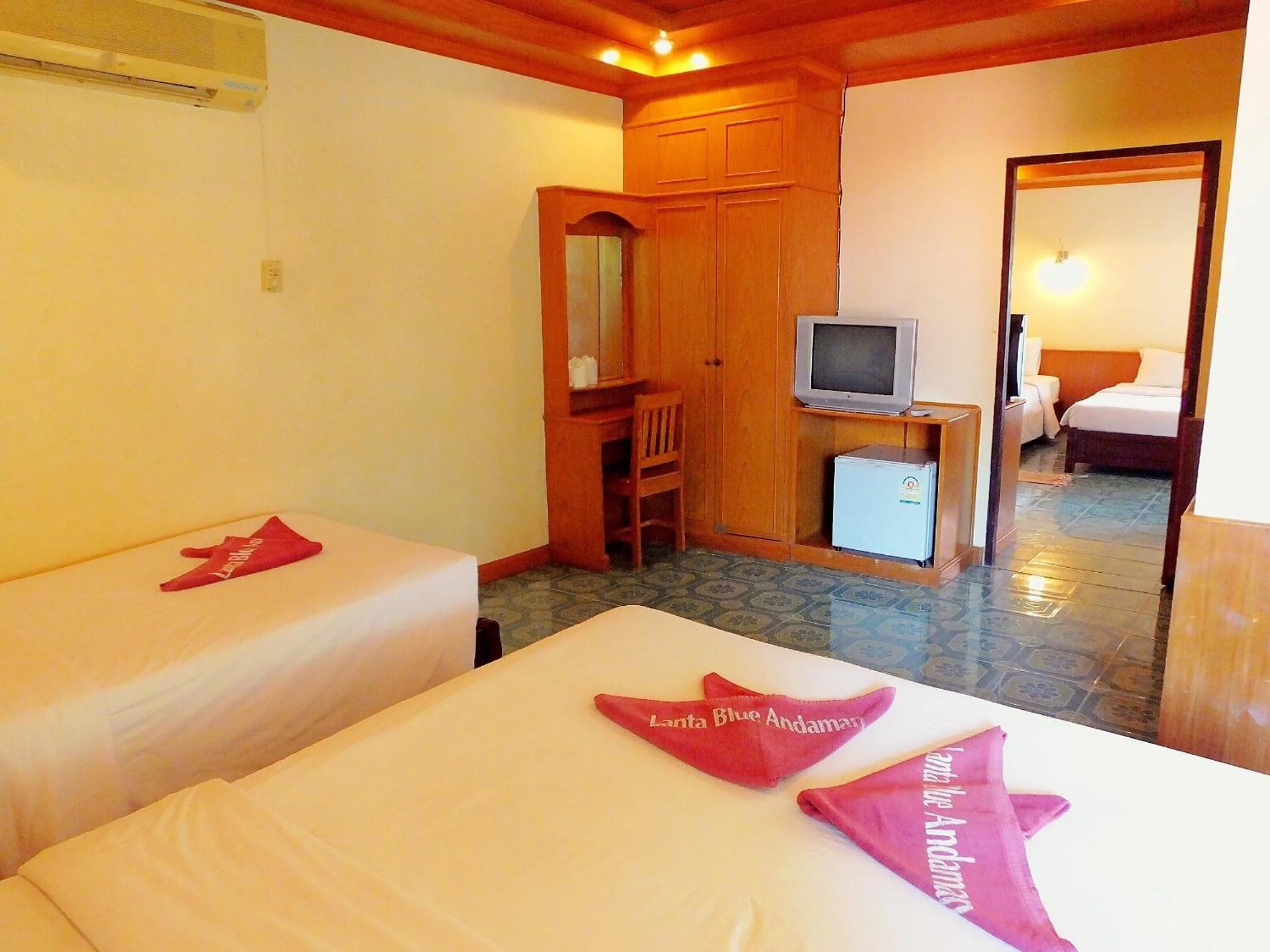 Bed in Blue Andaman Lanta Resort